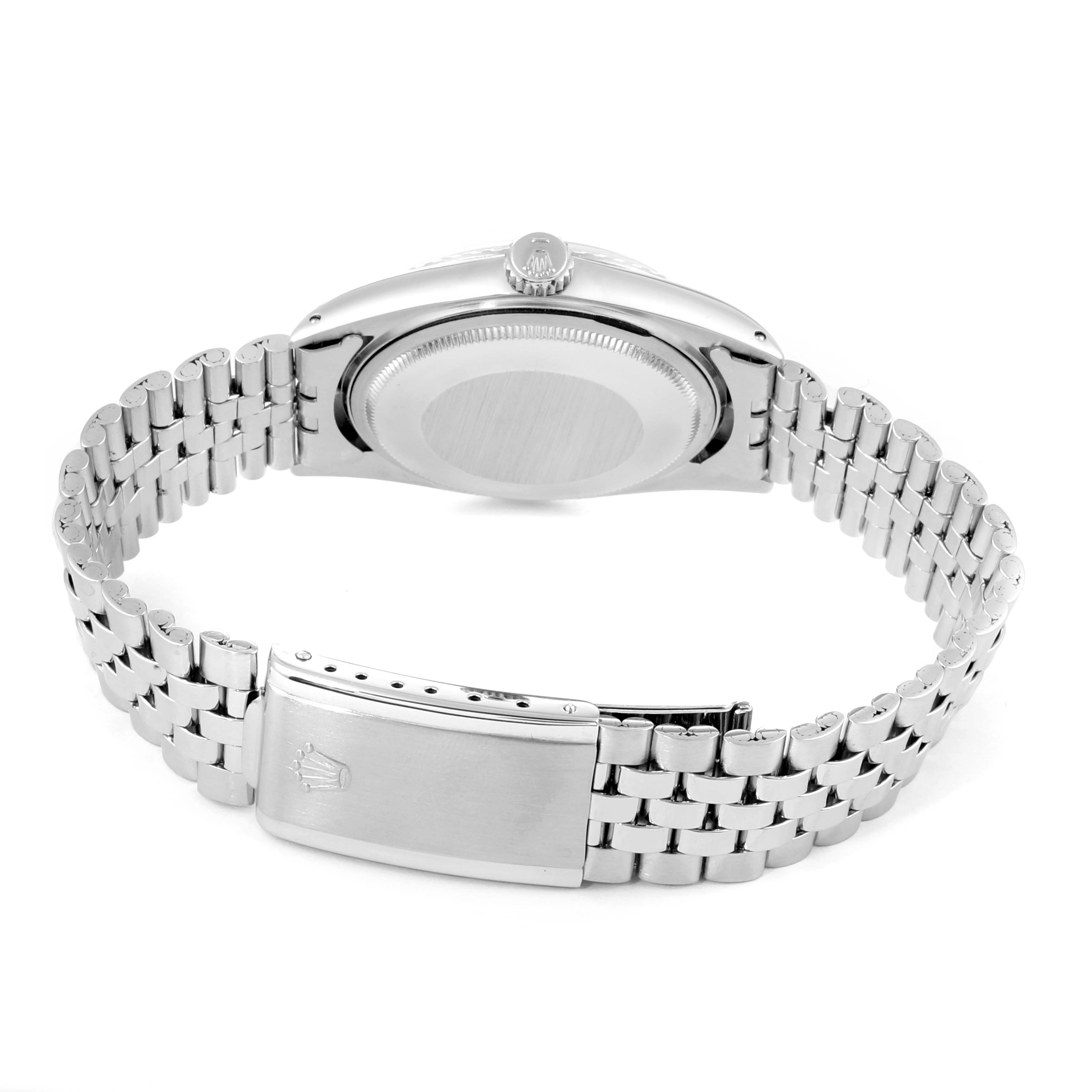 The image shows the Rolex Vintage Collection 1603 Men's Stainless Steel Silver Dial 1603 Men's Stainless Steel Silver Dial watch from the back, highlighting the stainless steel case and bracelet with the clasp.