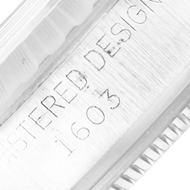 This close-up angle shows the engraved model number "1603" on the case of the Rolex Vintage Collection 1603 Men's Stainless Steel Silver Dial 1603 Men's Stainless Steel Silver Dial watch.