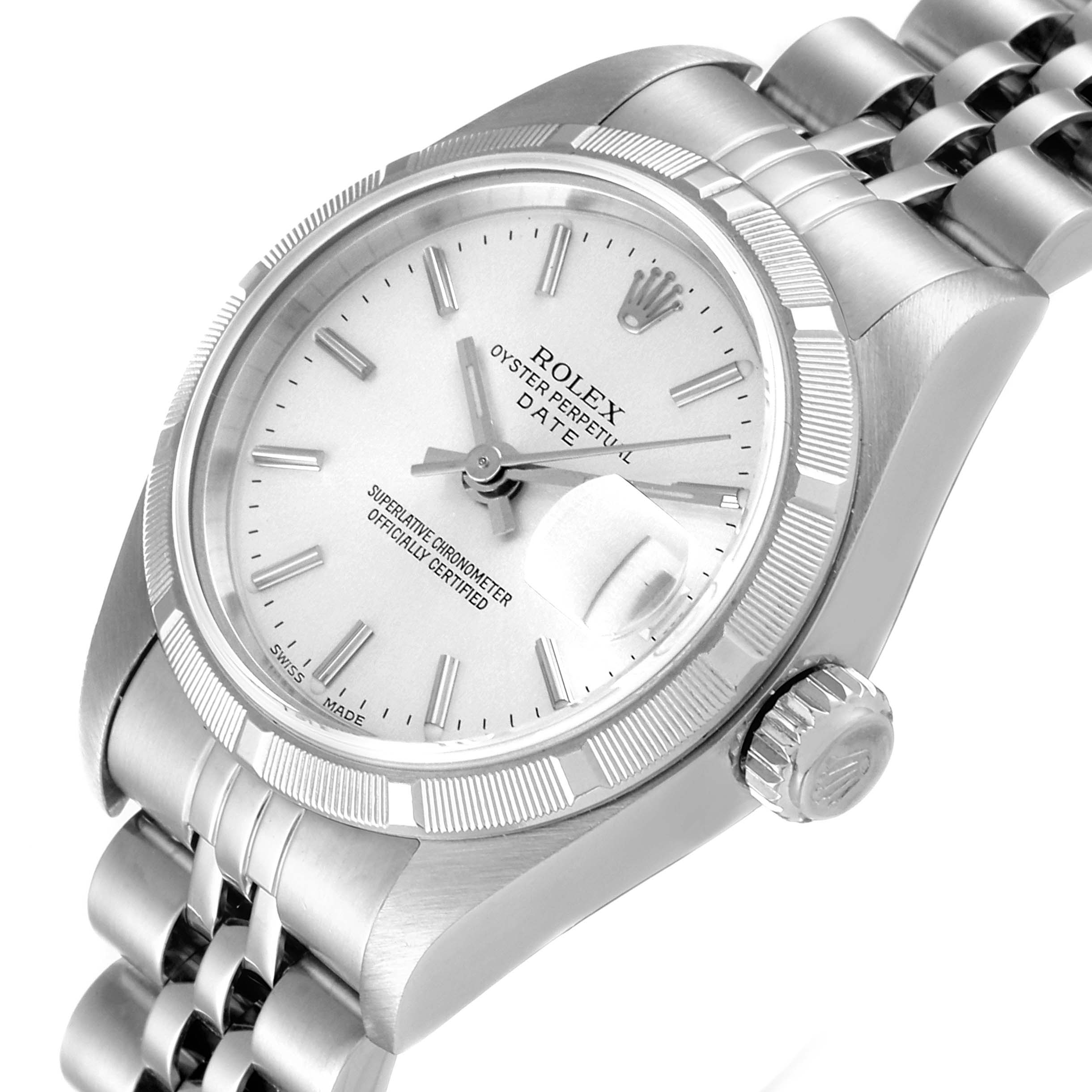 The image shows a close-up angle of a Rolex Oyster Perpetual Date, featuring the dial, bezel, crown, and part of the bracelet.