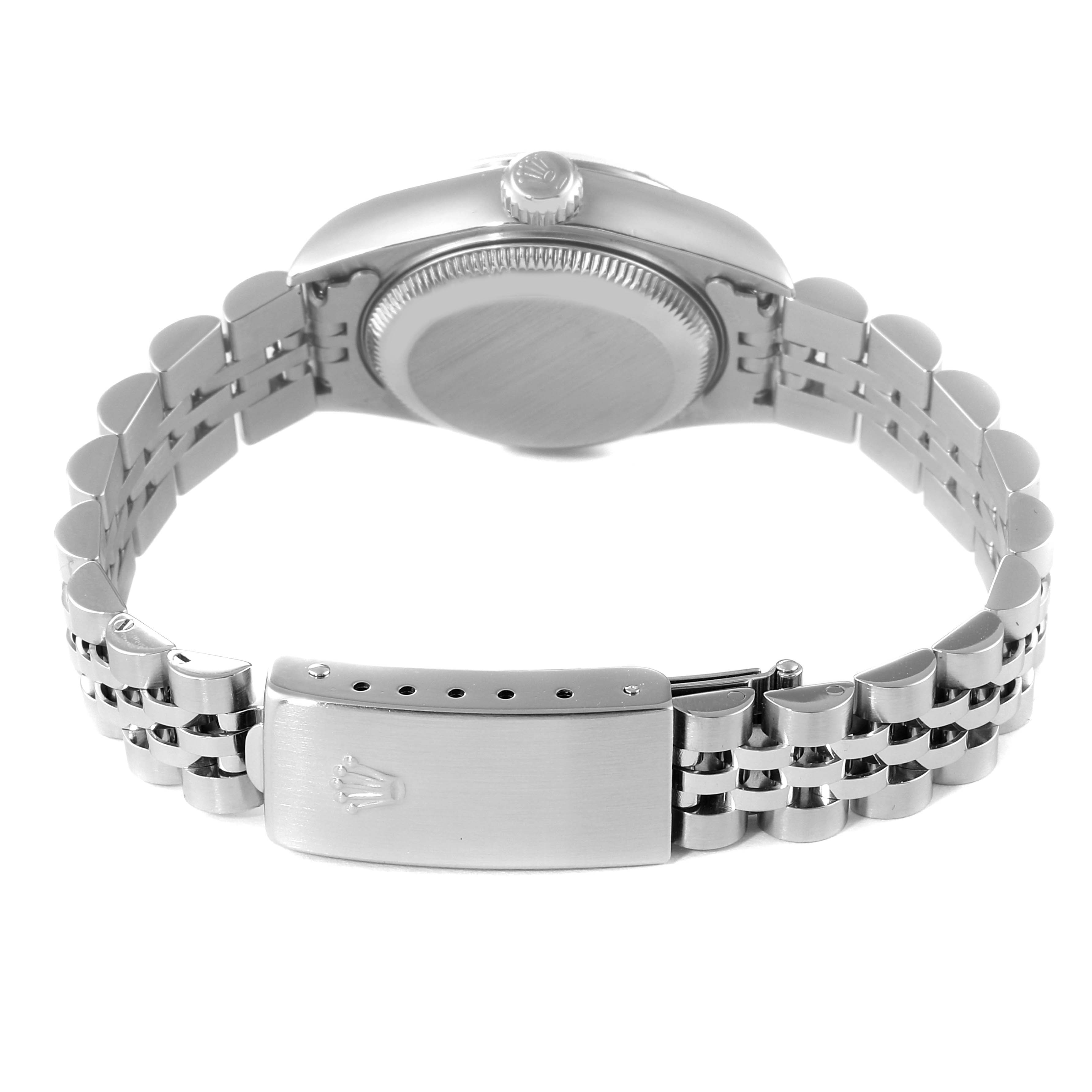 This image shows the back case, crown, and bracelet clasp of a Rolex Date 79190 Women's Stainless Steel Silver Dial 79190 Women's Stainless Steel Silver Dial model watch from a rear angle.