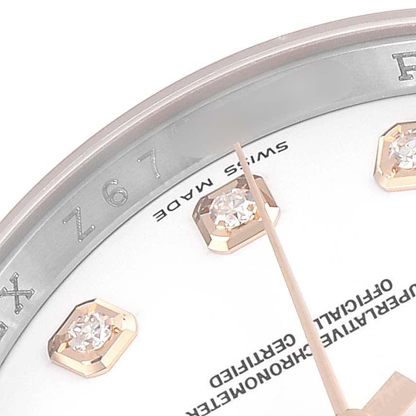 This close-up shows the dial, diamonds, and partial text of a Rolex Datejust 116201 Men's Steel and Gold (two tone) White Dial 116201 Men's Steel and Gold (two tone) White Dial watch.
