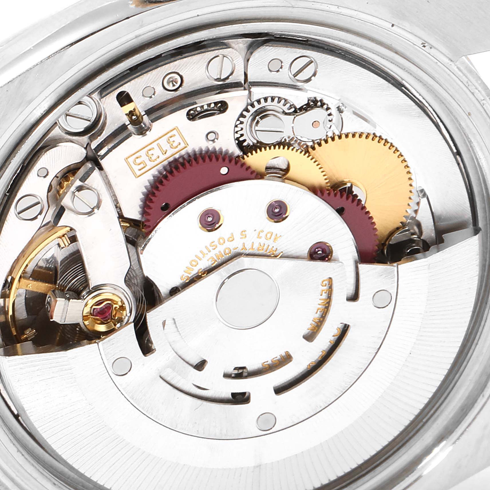 This image shows a close-up view of the movement components of a Rolex Datejust 116201 Men's Steel and Gold (two tone) White Dial 116201 Men's Steel and Gold (two tone) White Dial watch.