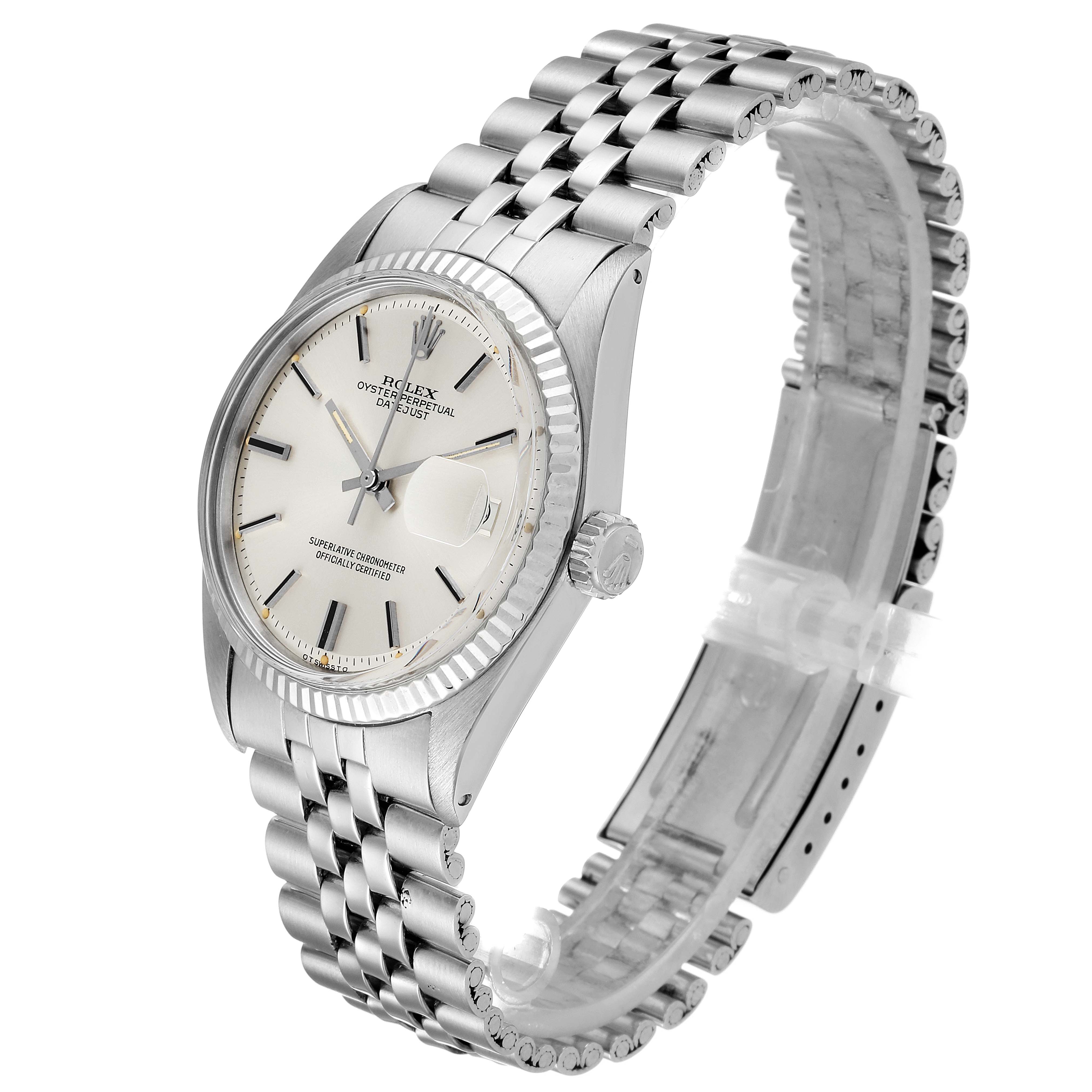 The image shows a side angle of the Rolex Vintage Collection 1601 Men's Stainless Steel Silver Dial 1601 Men's Stainless Steel Silver Dial watch, featuring its dial, case, crown, and bracelet.