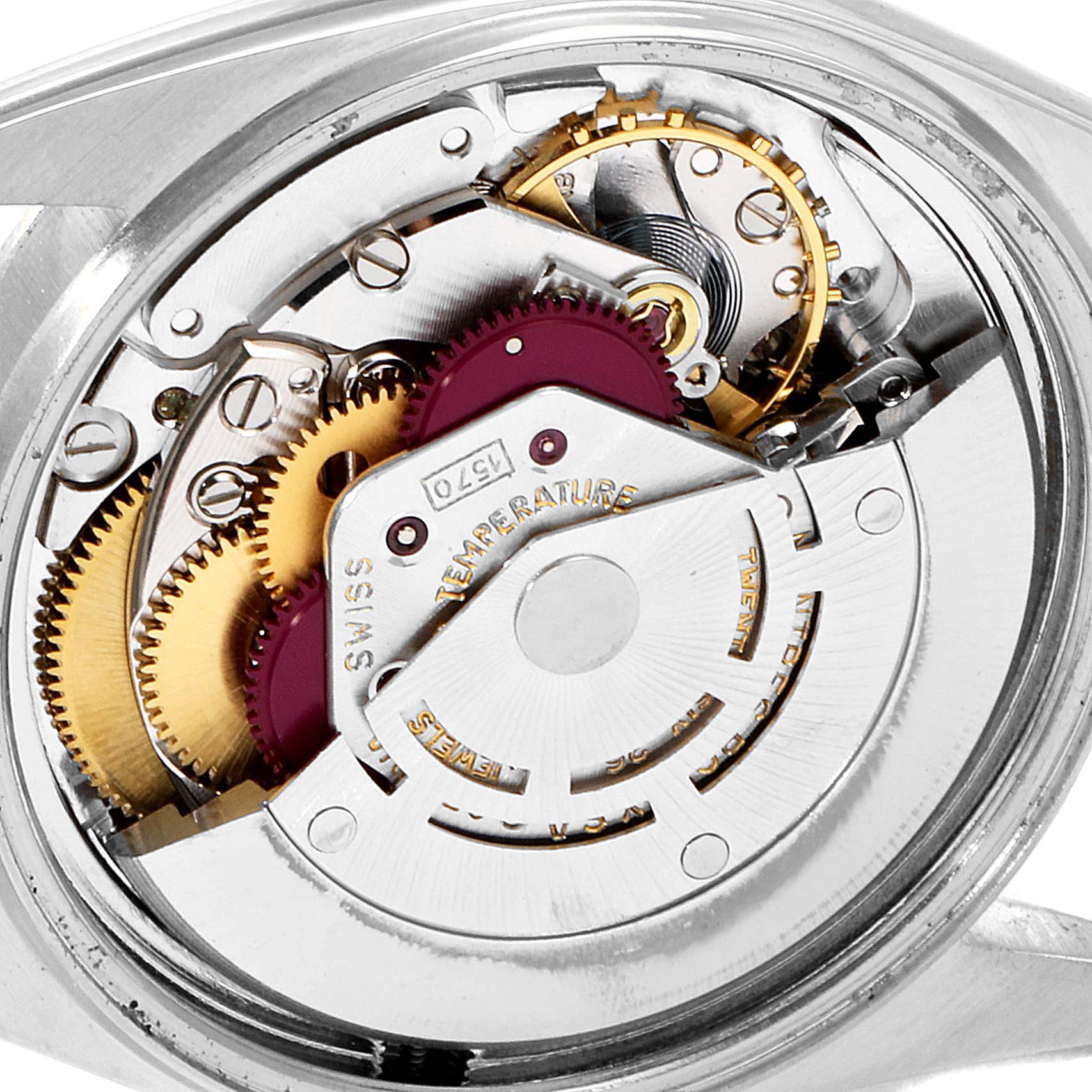The image shows the internal movement mechanism of a Vintage Collection Rolex watch viewed from the back.