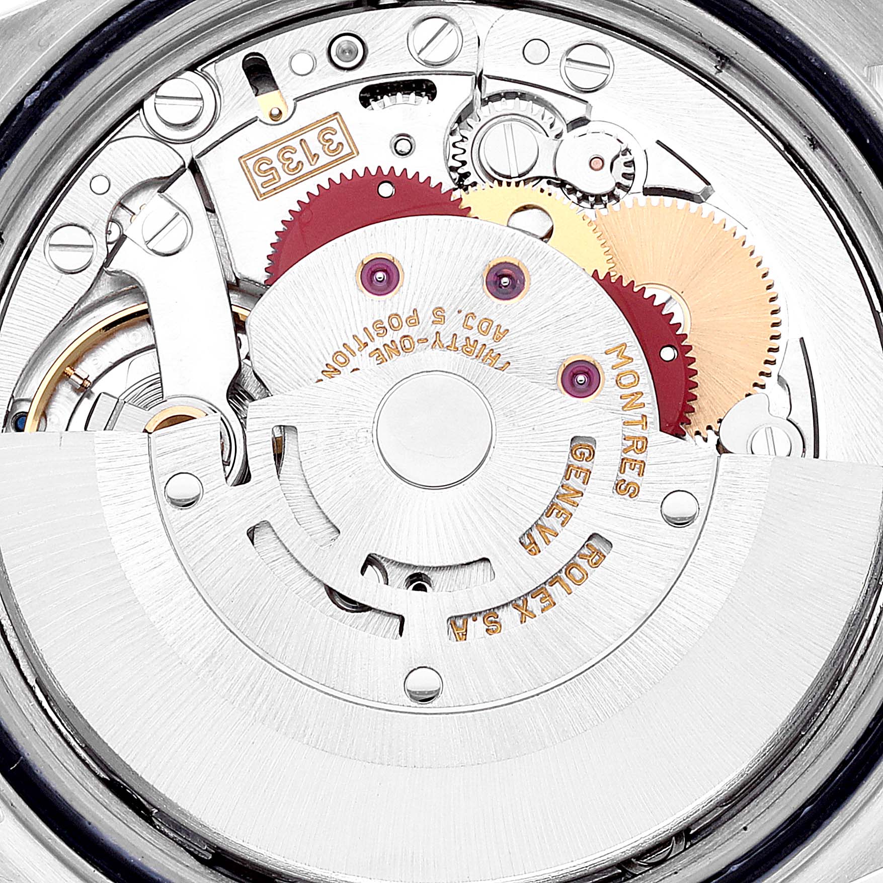 This is a close-up view of the Rolex Datejust 16233 Men's Steel and Gold (two tone) Silver Dial 16233 Men's Steel and Gold (two tone) Silver Dial movement, showcasing its intricate gears and components.