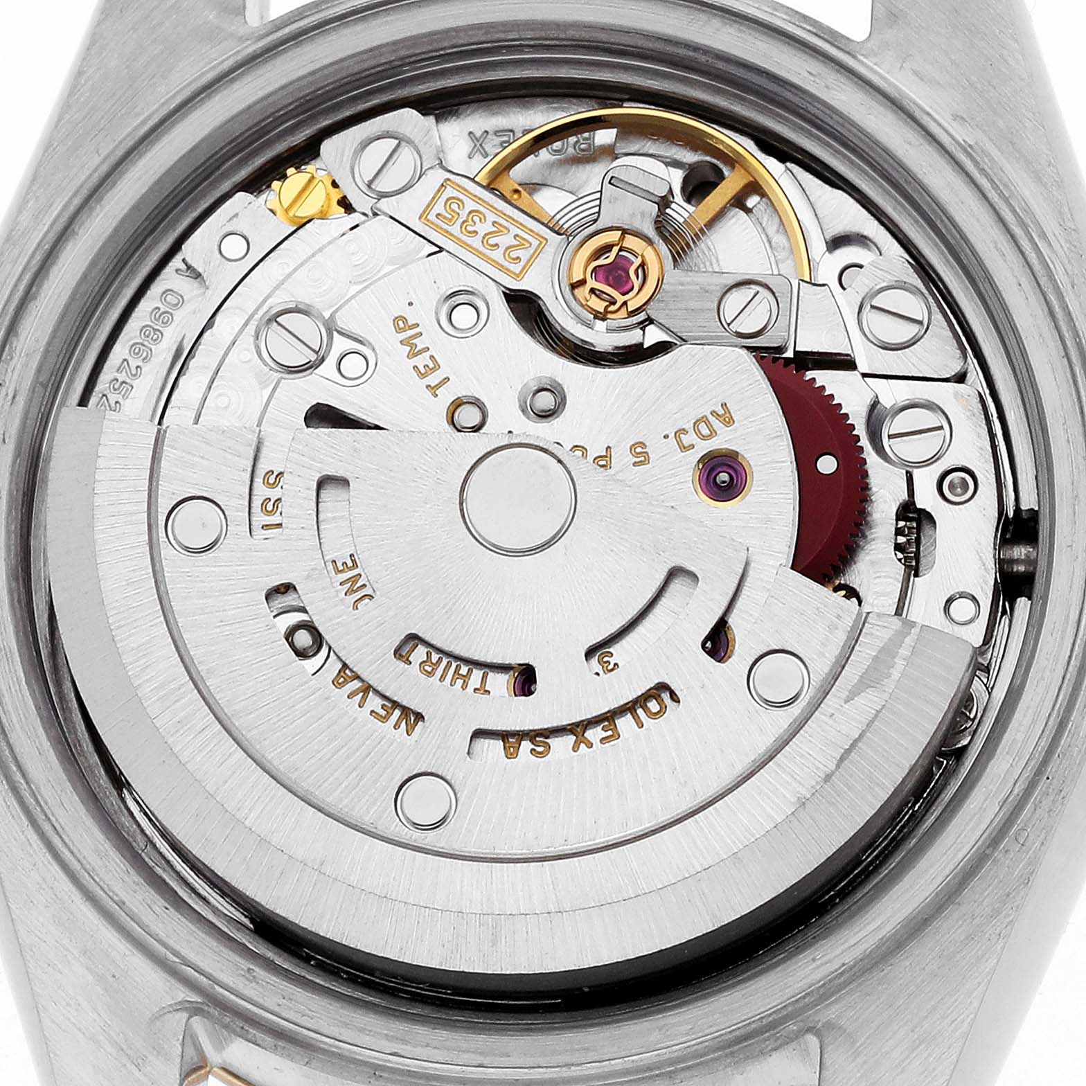 The image shows a close-up of the movement inside a Rolex Datejust 79163 Women's Steel and Gold (two tone) Grey Dial 79163 Women's Steel and Gold (two tone) Grey Dial watch, focusing on the automatic rotor and internal components.