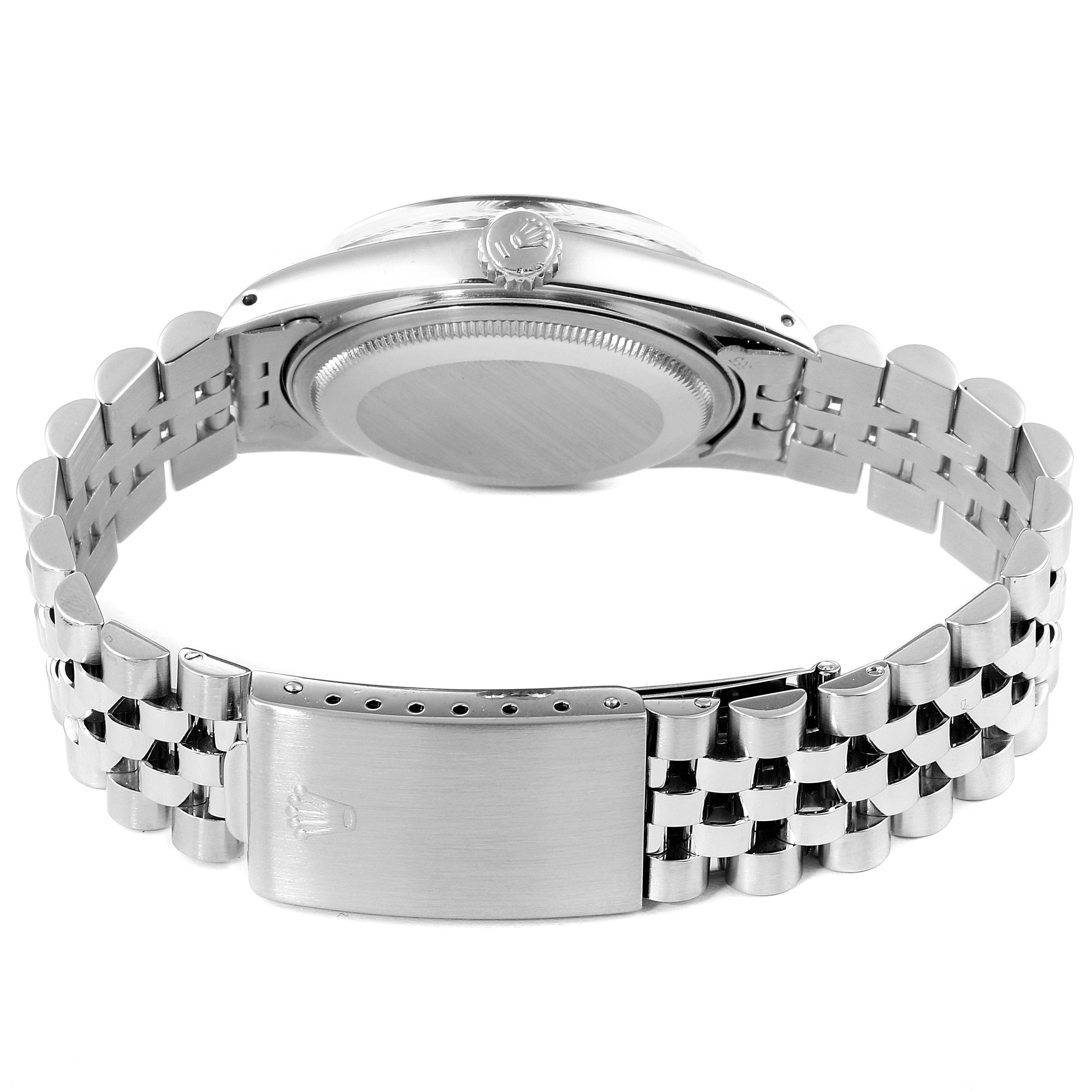 The image shows the back and bracelet clasp of a Rolex Vintage Collection 16014 Men's Stainless Steel Black Dial 16014 Men's Stainless Steel Black Dial model watch.