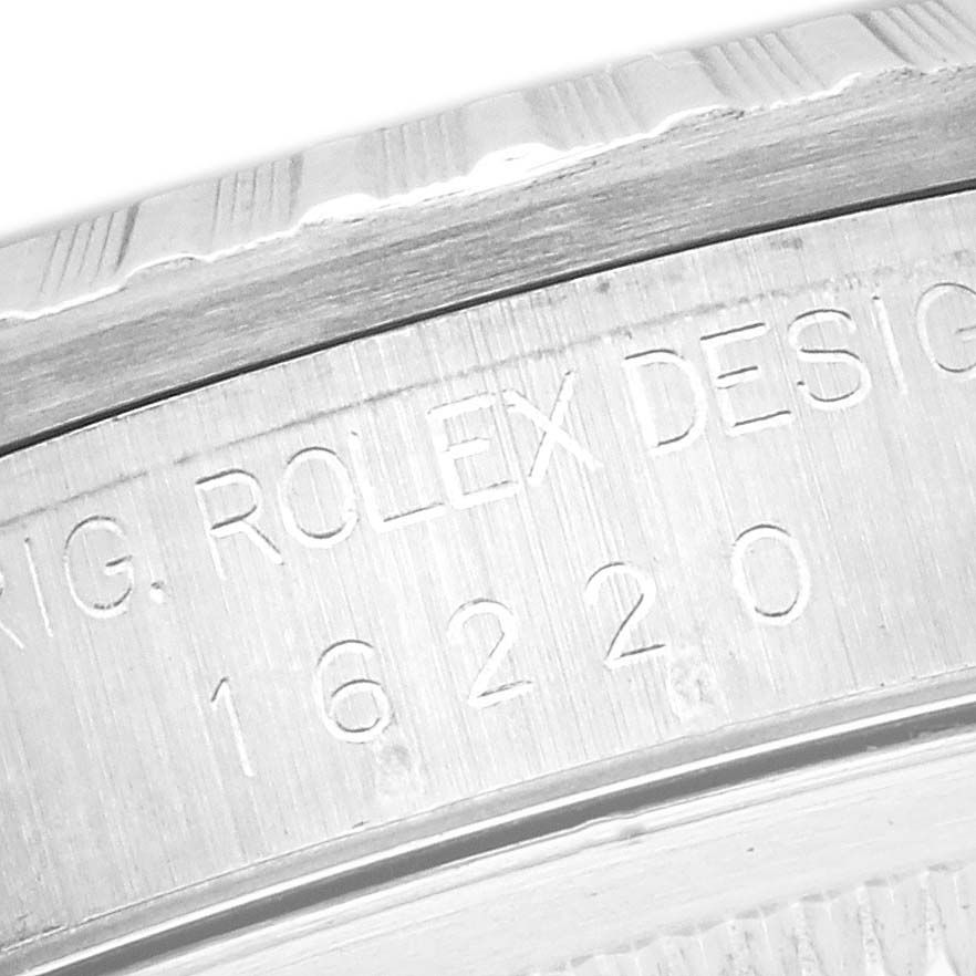 The image shows a close-up of the side engraving on the Rolex Datejust 16220 Men's Stainless Steel White Dial 16220 Men's Stainless Steel White Dial watch case, highlighting the model number.