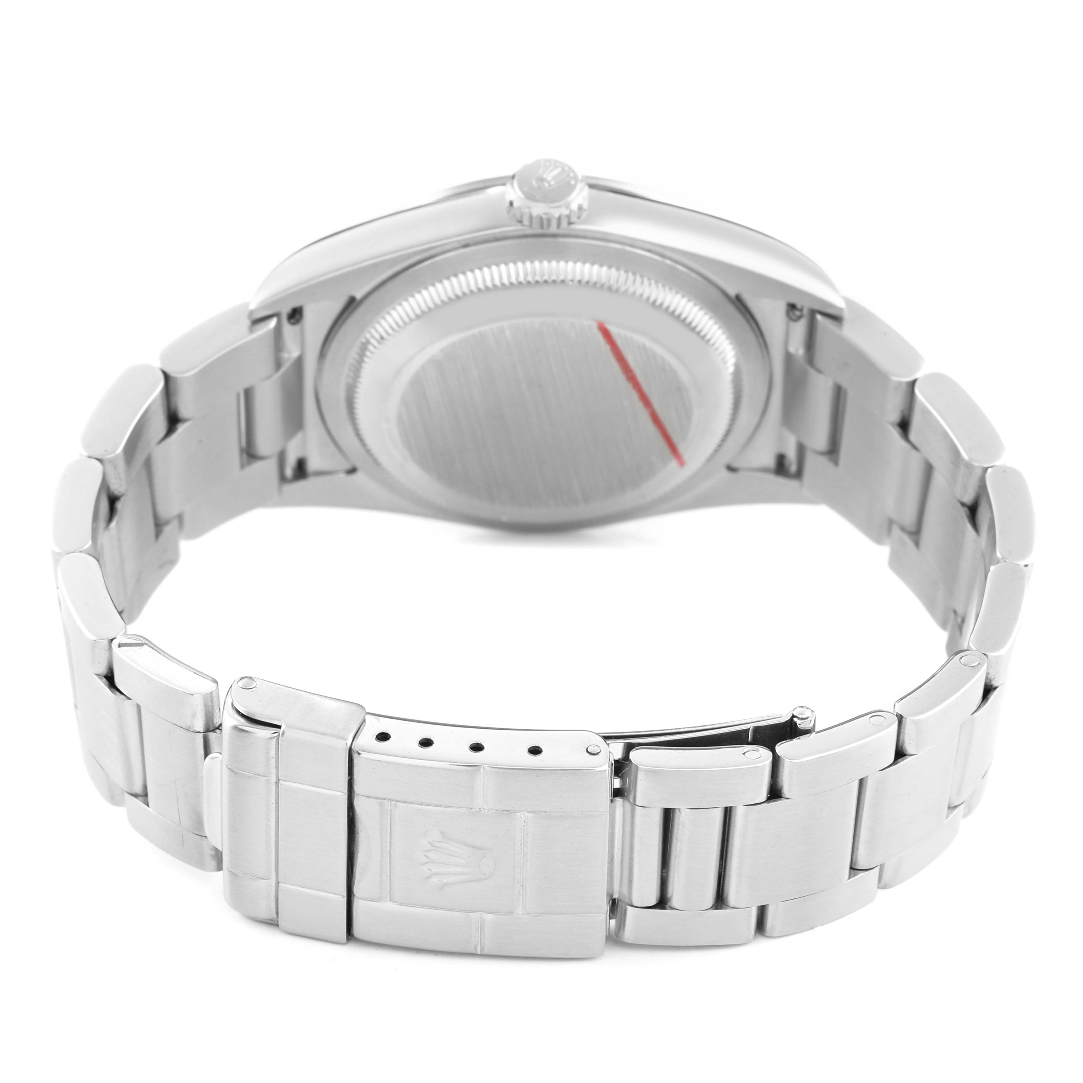 The image shows the back of the Rolex Explorer 114270 Men's Stainless Steel Black Dial watch, focusing on the case back and bracelet.