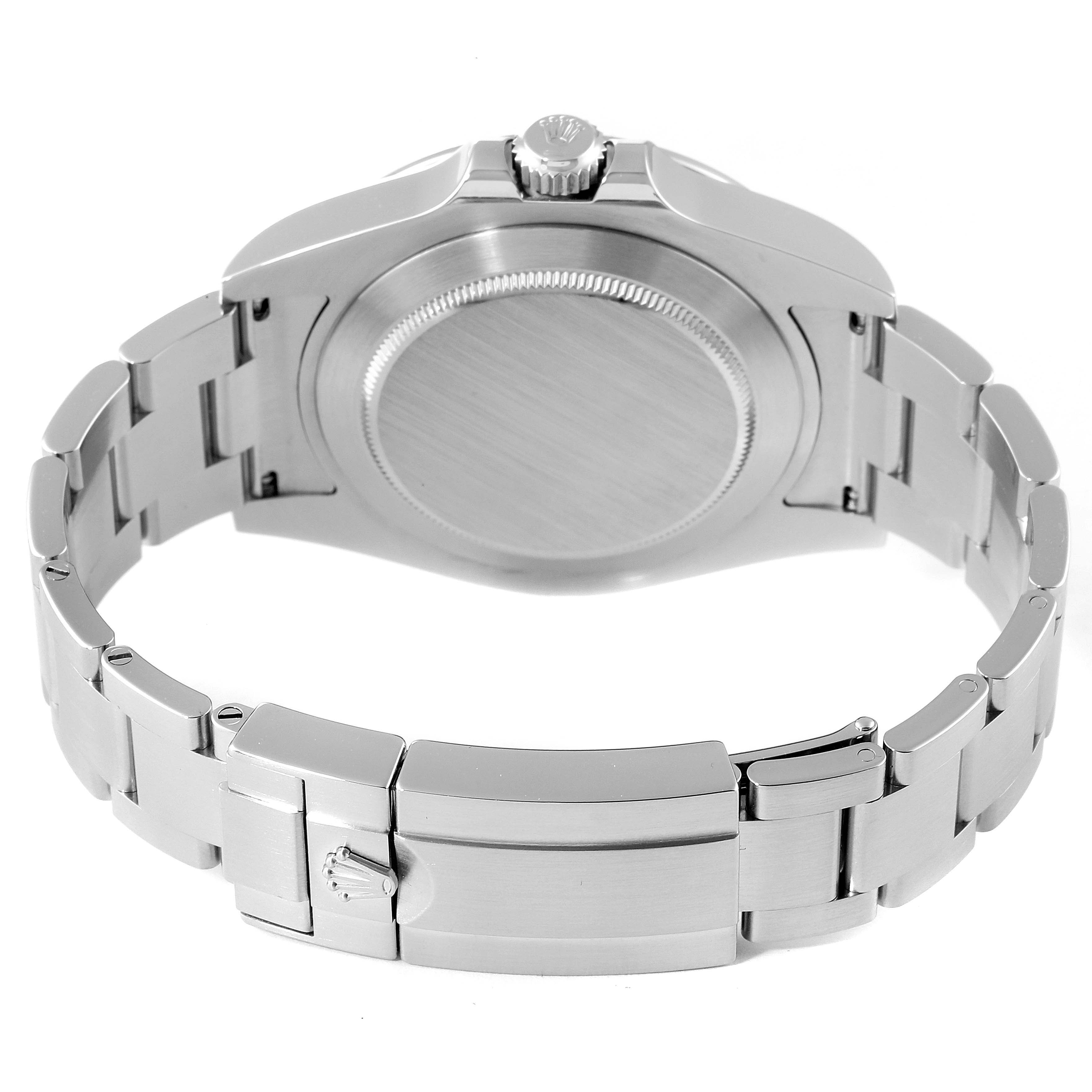 The image shows the back of the Rolex Explorer 216570 Men's Stainless Steel Black Dial 216570 Men's Stainless Steel Black Dial watch, highlighting the case, crown, and bracelet with a closed clasp.