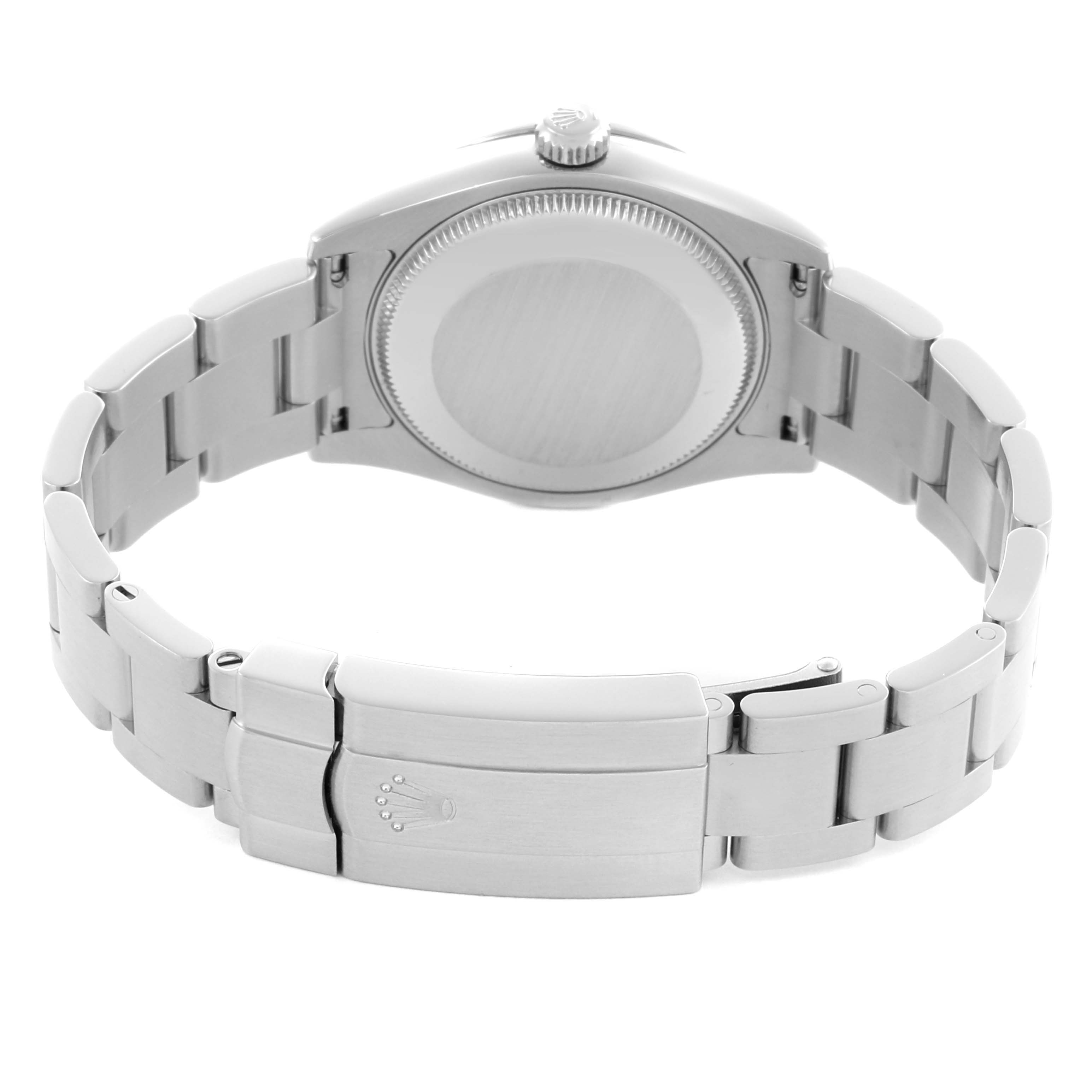 The Mid-Size Rolex watch is shown from the back, highlighting its closed clasp and stainless steel bracelet.