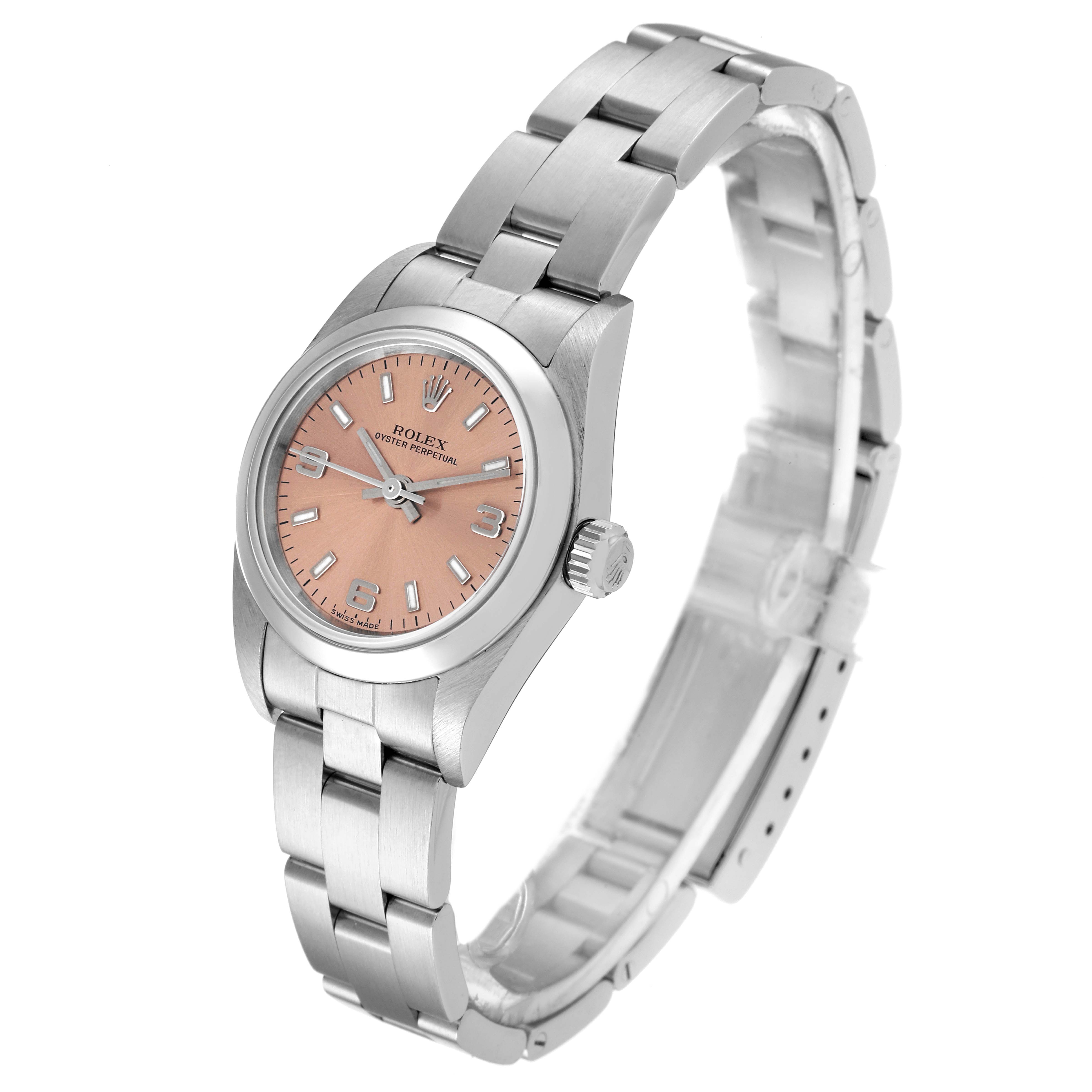 This Rolex Oyster Perpetual 76080 Women
s Stainless Steel Pink Dial 76080 Women
s Stainless Steel Pink Dial watch is shown at an angled view, highlighting its dial, bezel, crown, and bracelet.