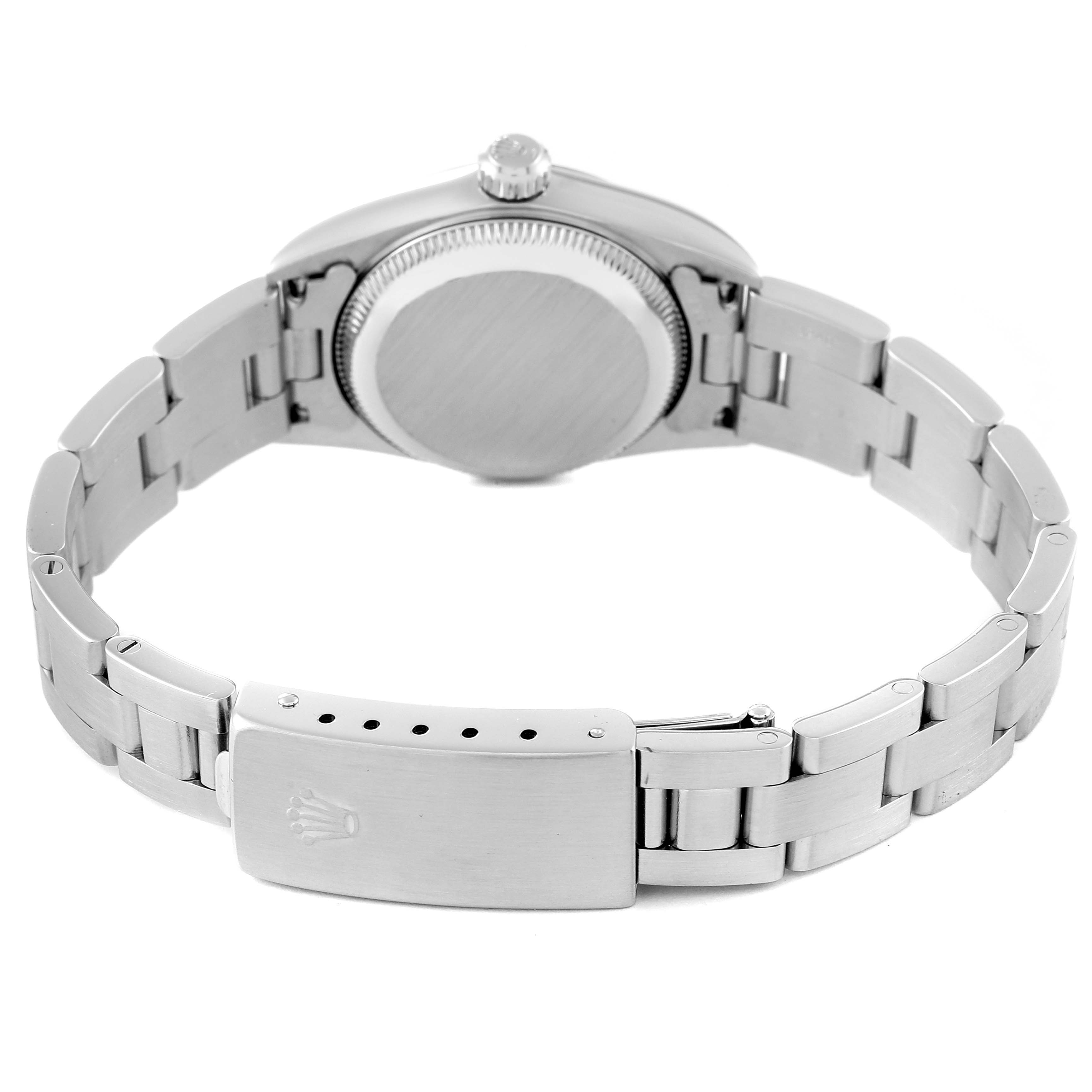 The image shows the back view of a Rolex Oyster Perpetual 76080 Women
s Stainless Steel Pink Dial 76080 Women
s Stainless Steel Pink Dial watch, highlighting its clasp and bracelet links.