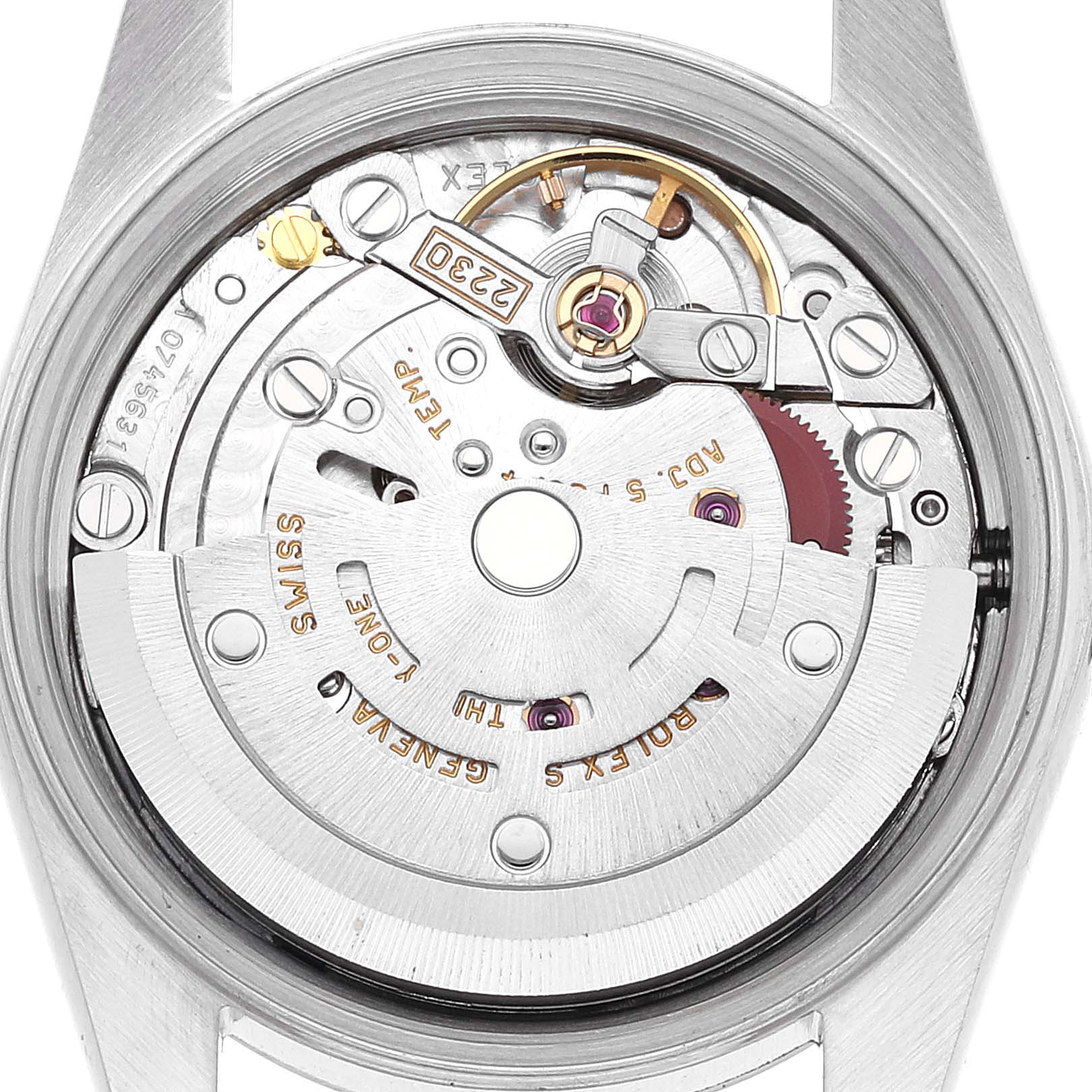 This image shows the inner mechanics and movement of a Rolex Oyster Perpetual 76080 Women
s Stainless Steel Pink Dial 76080 Women
s Stainless Steel Pink Dial watch from a straight-on angle.