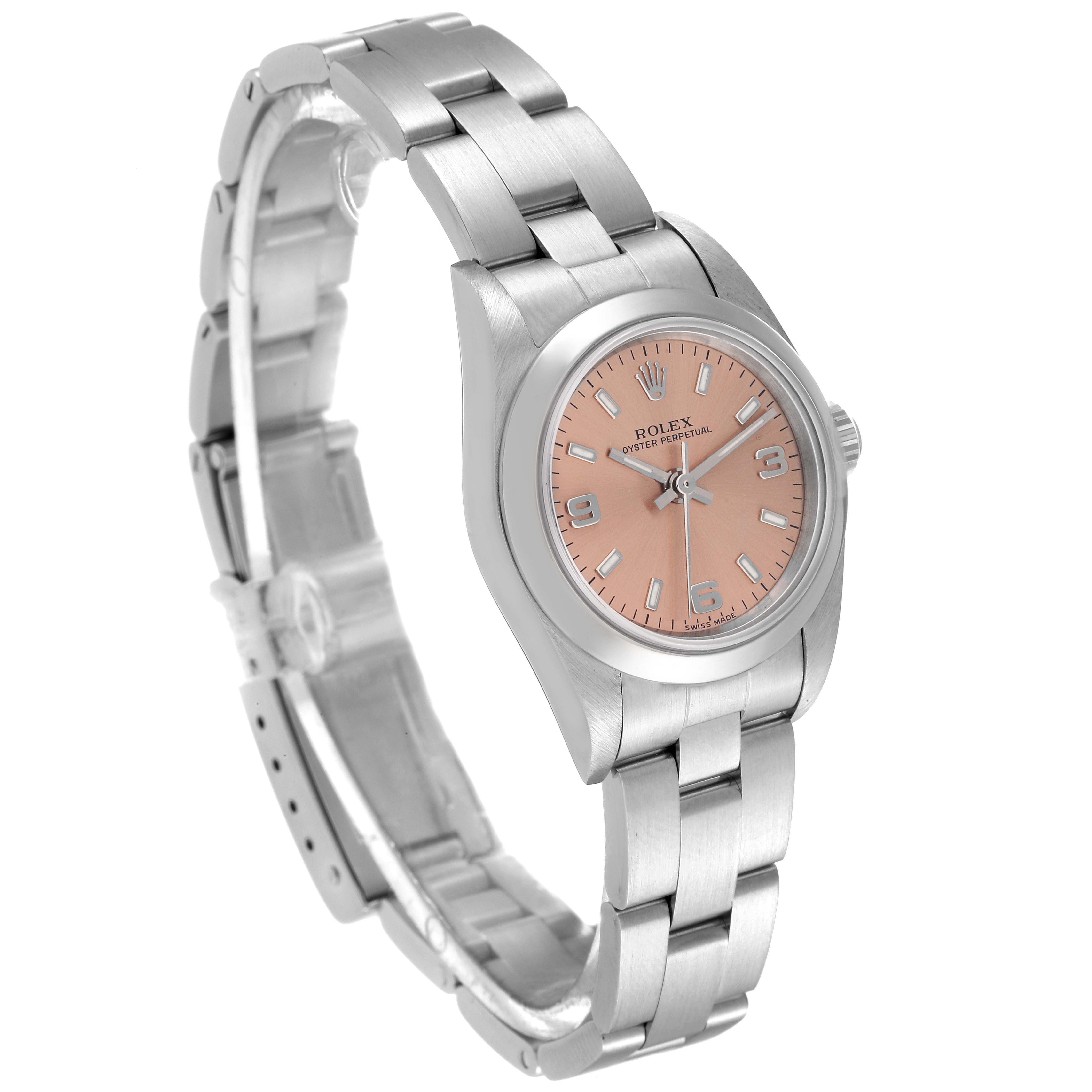 The Rolex Oyster Perpetual 76080 Women
s Stainless Steel Pink Dial 76080 Women
s Stainless Steel Pink Dial watch is shown at a slight angle, highlighting the pink dial, metal bracelet, and case.