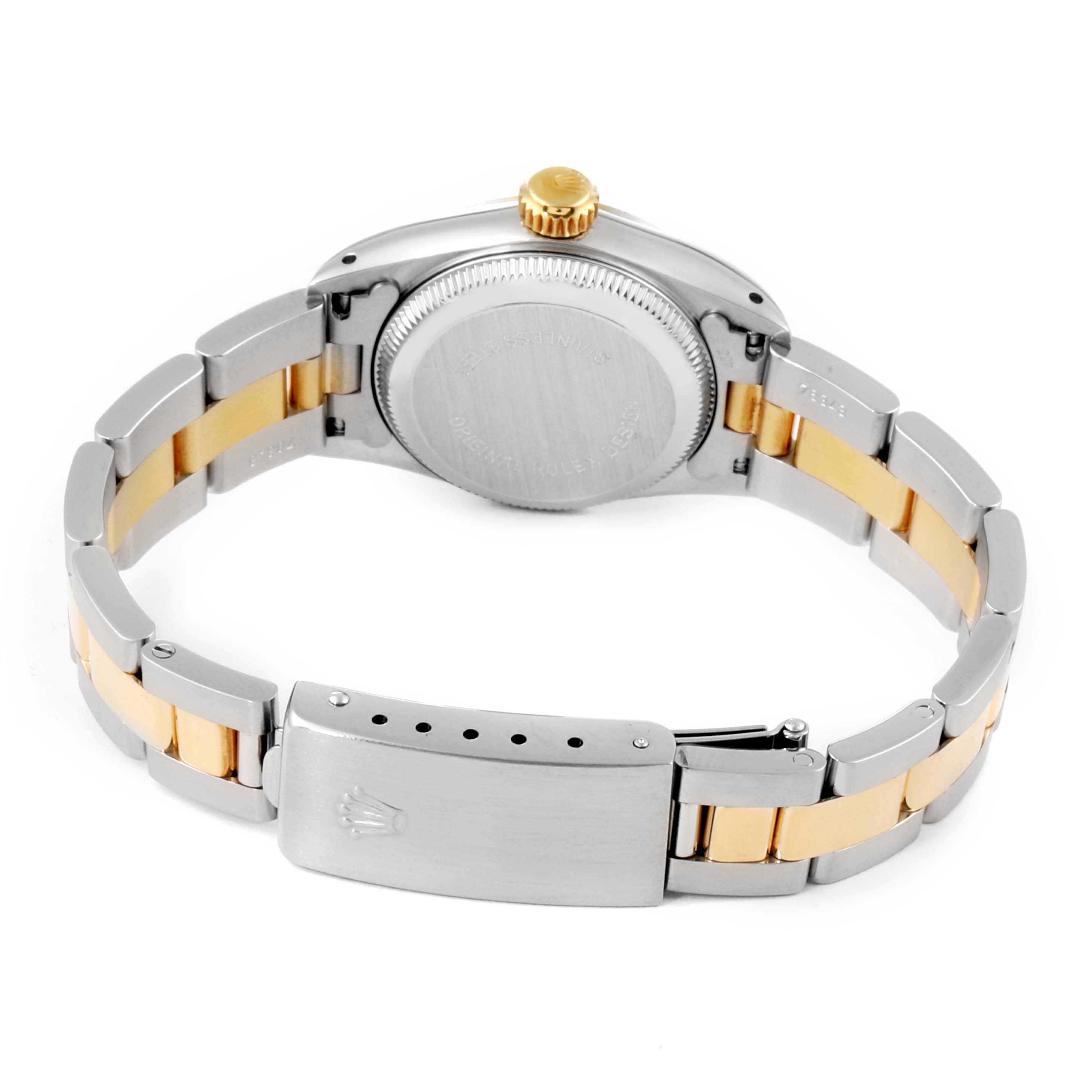 The image shows the back view of the Rolex Oyster Perpetual 67193 Women's Steel and Gold (two tone) White Dial 67193 Women's Steel and Gold (two tone) White Dial watch, highlighting its clasp, bracelet links, and case back.