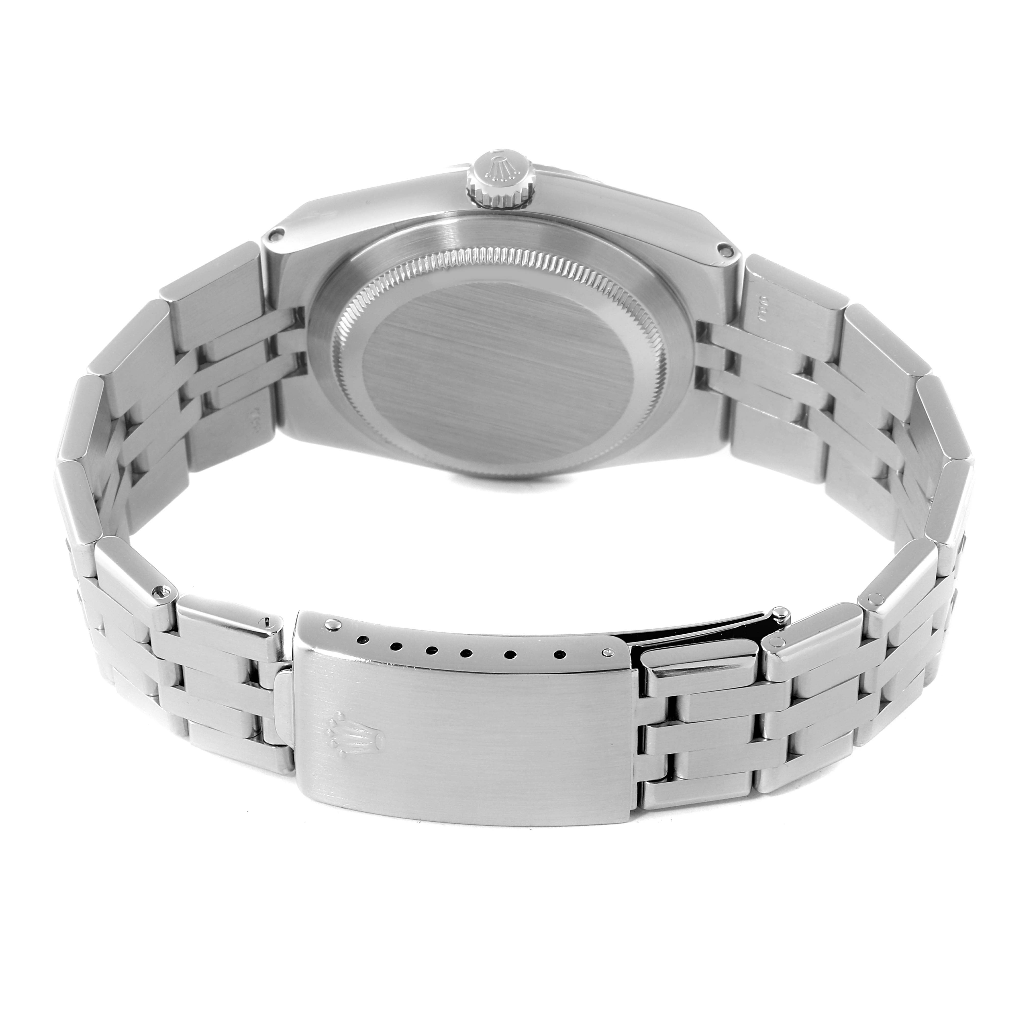 The image shows the back case and stainless steel bracelet of the Rolex Oysterquartz 17014 Men
s Stainless Steel Silver Dial 17014 Men
s Stainless Steel Silver Dial watch viewed from the rear.