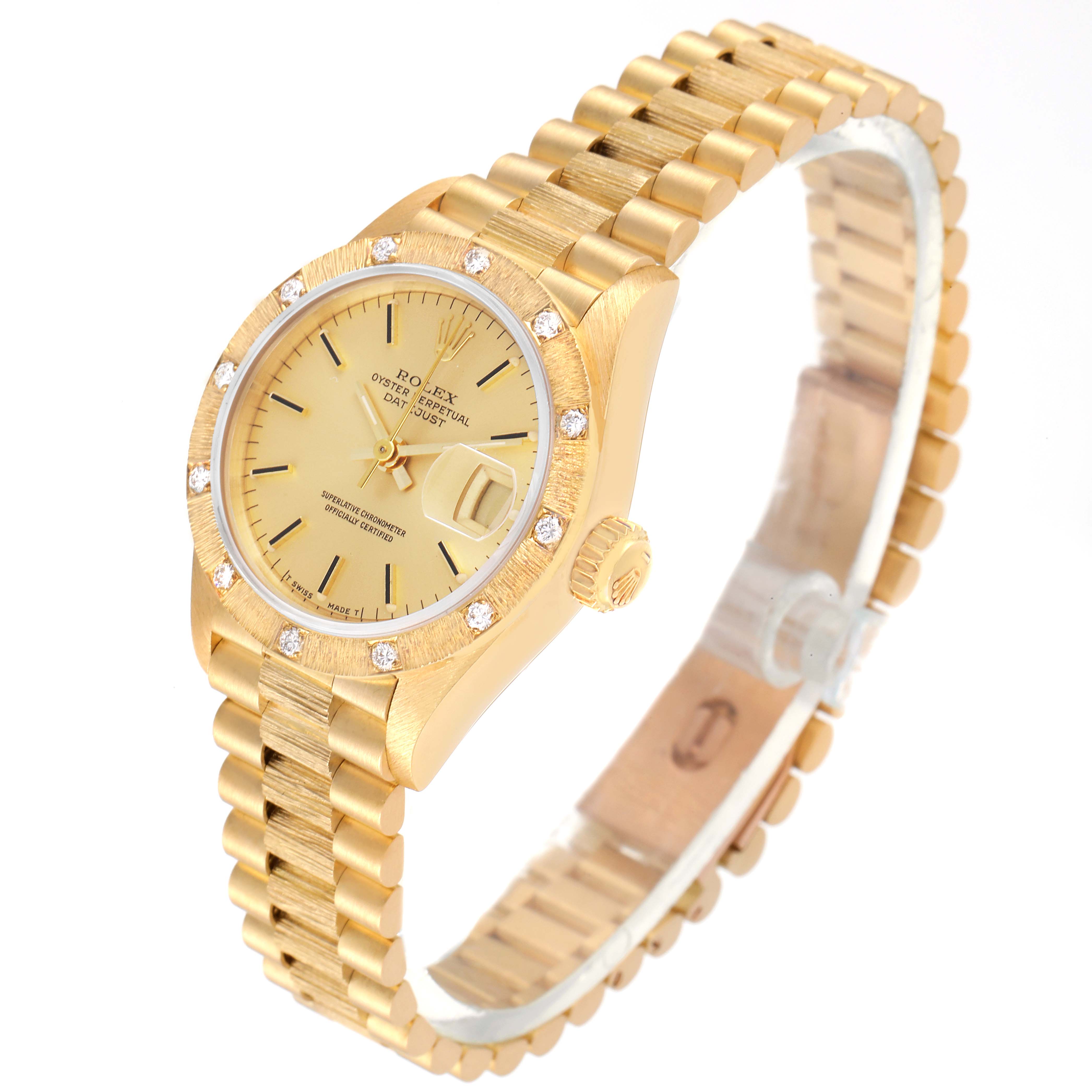 The Rolex President 69288 Women
s Yellow Gold Champagne Dial 69288 Women
s Yellow Gold Champagne Dial model watch is shown at an angle highlighting its face, band, and crown, featuring a gold design with diamond accents.