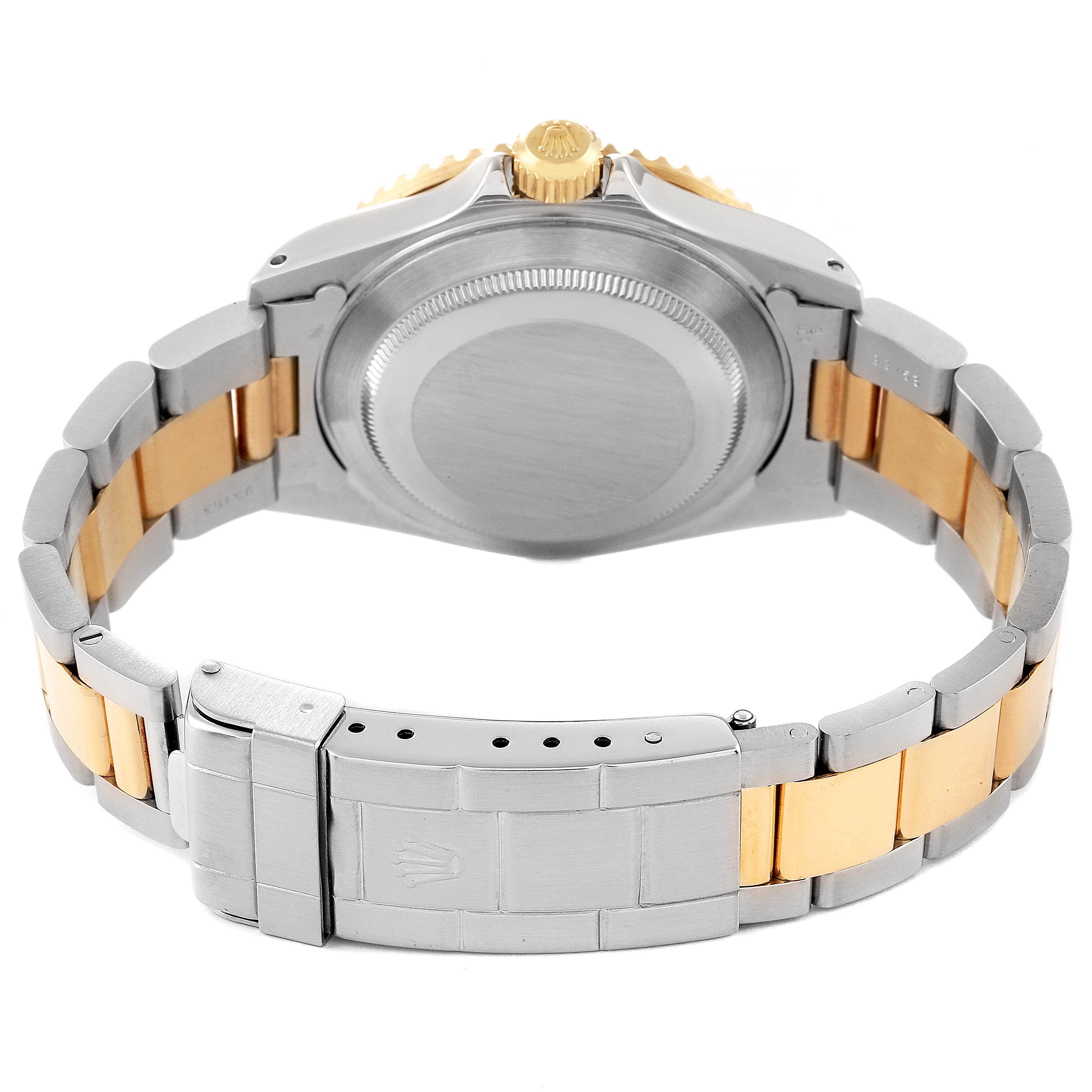 The image shows the back and bracelet of a Rolex Submariner 16613 Men's Steel and Gold (two tone) Blue Dial 16613 Men's Steel and Gold (two tone) Blue Dial watch, highlighting its clasp and case back.