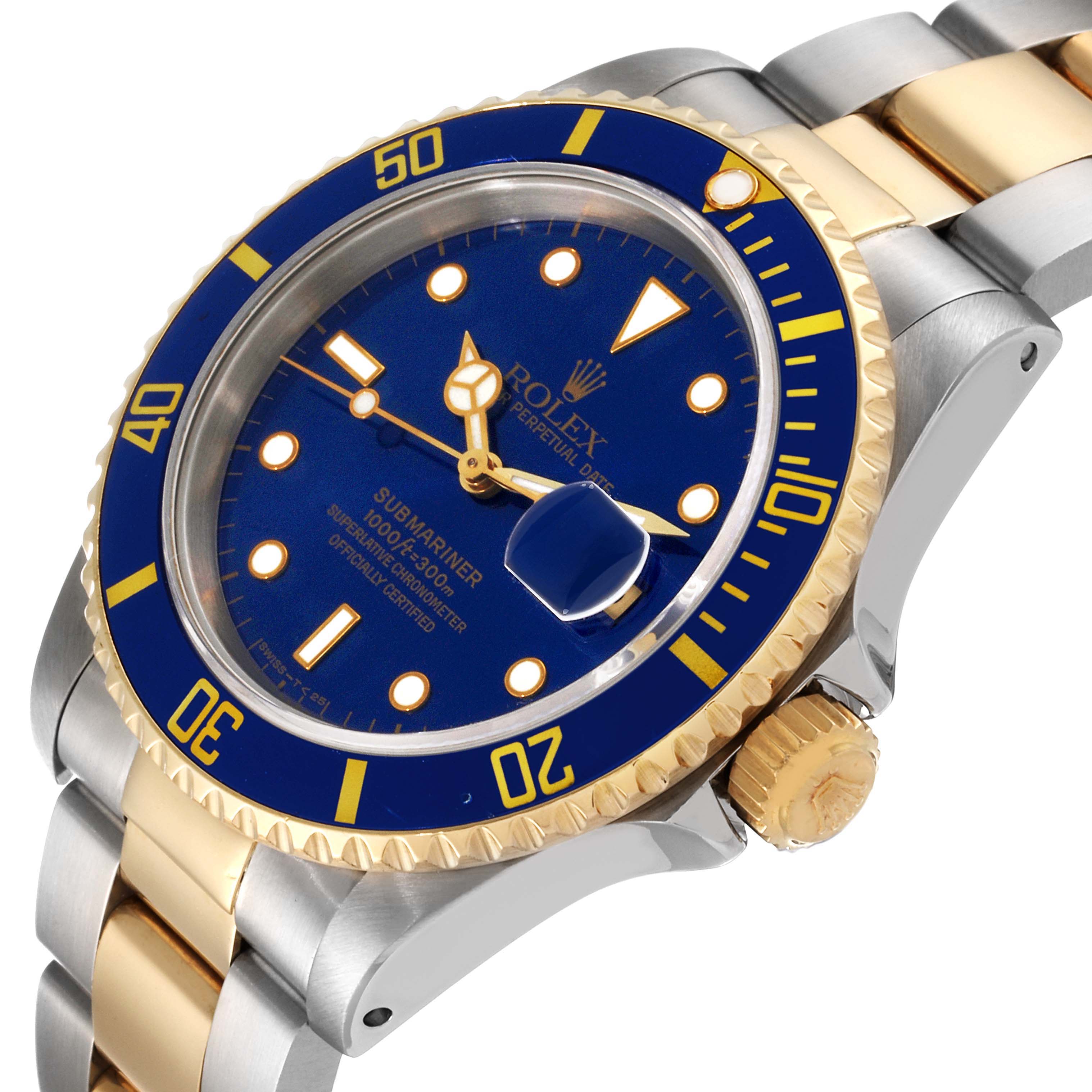 The image shows a side angle of the Rolex Submariner 16613 Men's Steel and Gold (two tone) Blue Dial 16613 Men's Steel and Gold (two tone) Blue Dial watch, highlighting its blue dial, bezel, and two-tone bracelet.