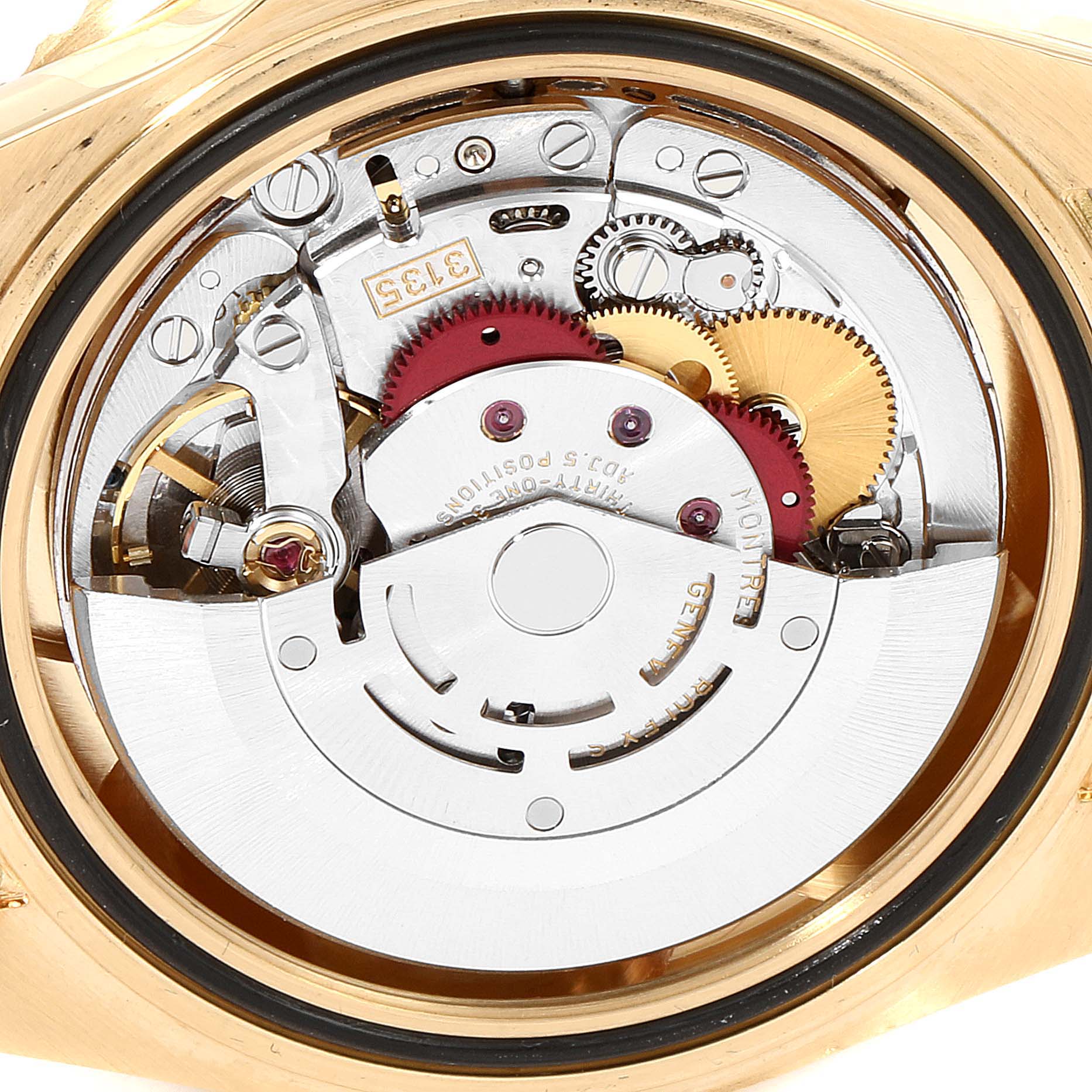 The image shows the intricate movement mechanism of a Rolex Submariner 16618 Men
s Yellow Gold Blue Dial 16618 Men
s Yellow Gold Blue Dial watch from a rear angle.