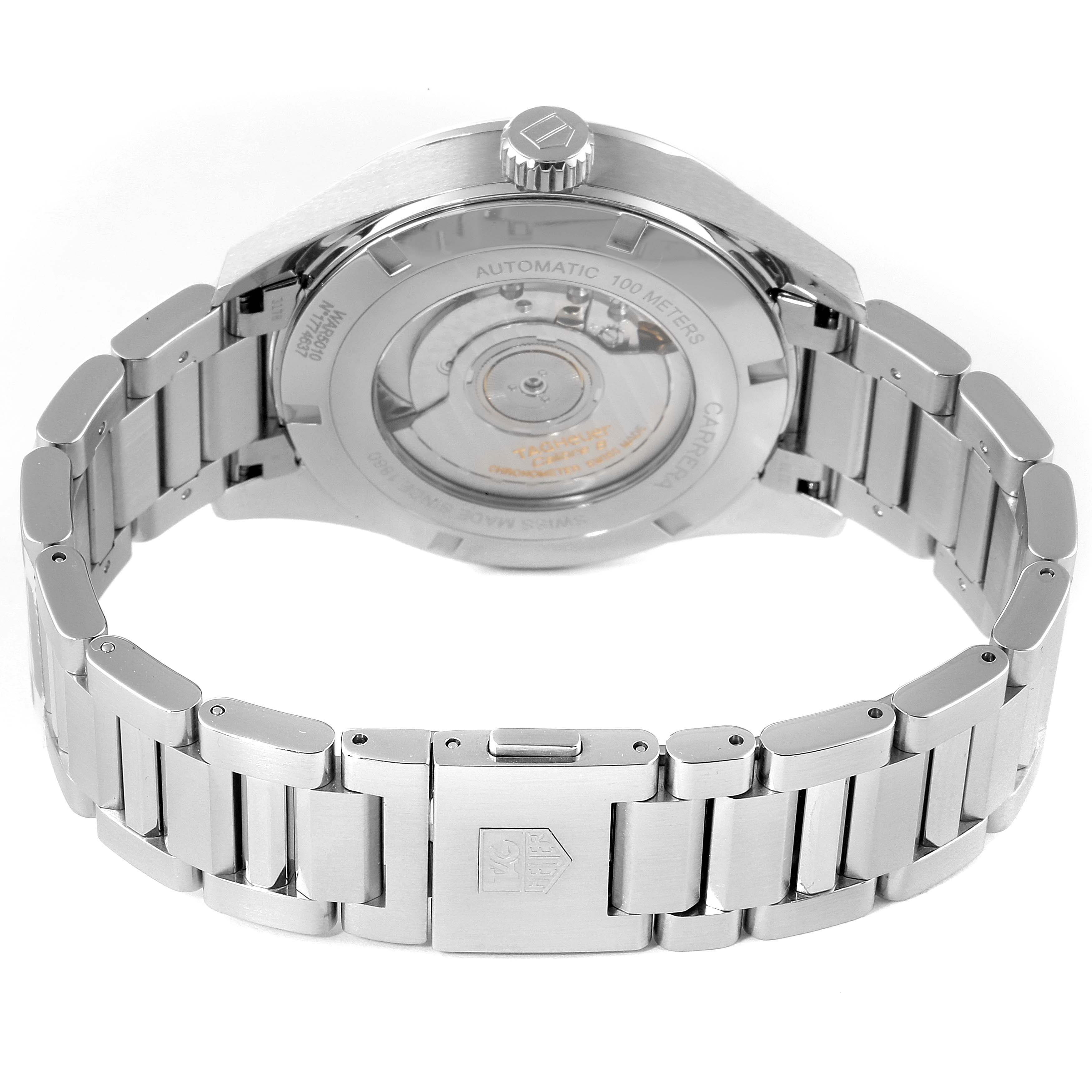 This image shows the back view of the Tag Heuer Carrera WAR5010.BA0723 Men
s Stainless Steel Black Dial WAR5010.BA0723 Men
s Stainless Steel Black Dial watch, highlighting its clasp, bracelet, and mechanical movement.