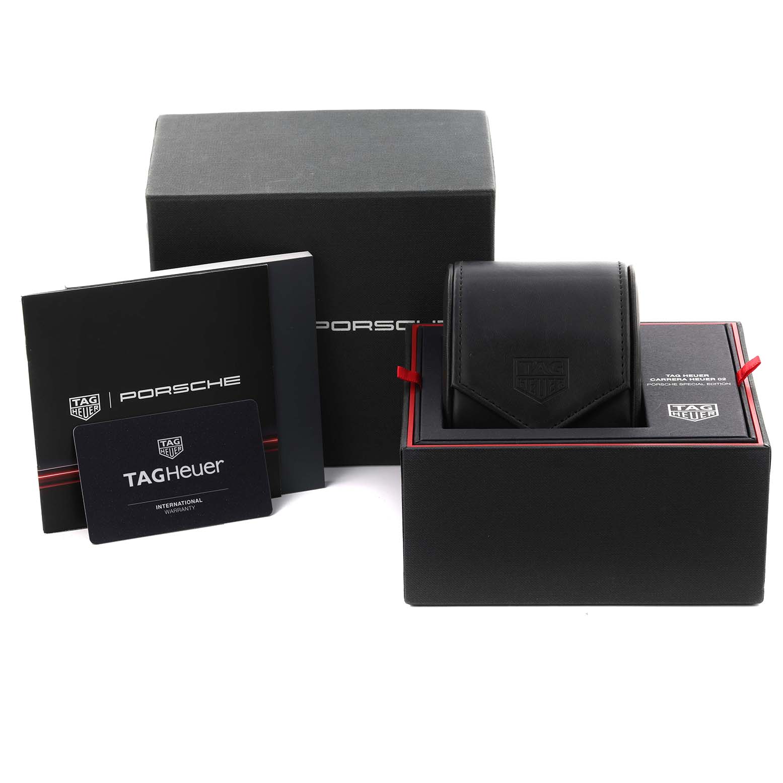 The image shows the packaging and accessories for a Tag Heuer Carrera CBN2A1F.FC6492 Men's Stainless Steel Grey Dial CBN2A1F.FC6492 Men's Stainless Steel Grey Dial watch, including boxes, a card, and a booklet, from a front angle.