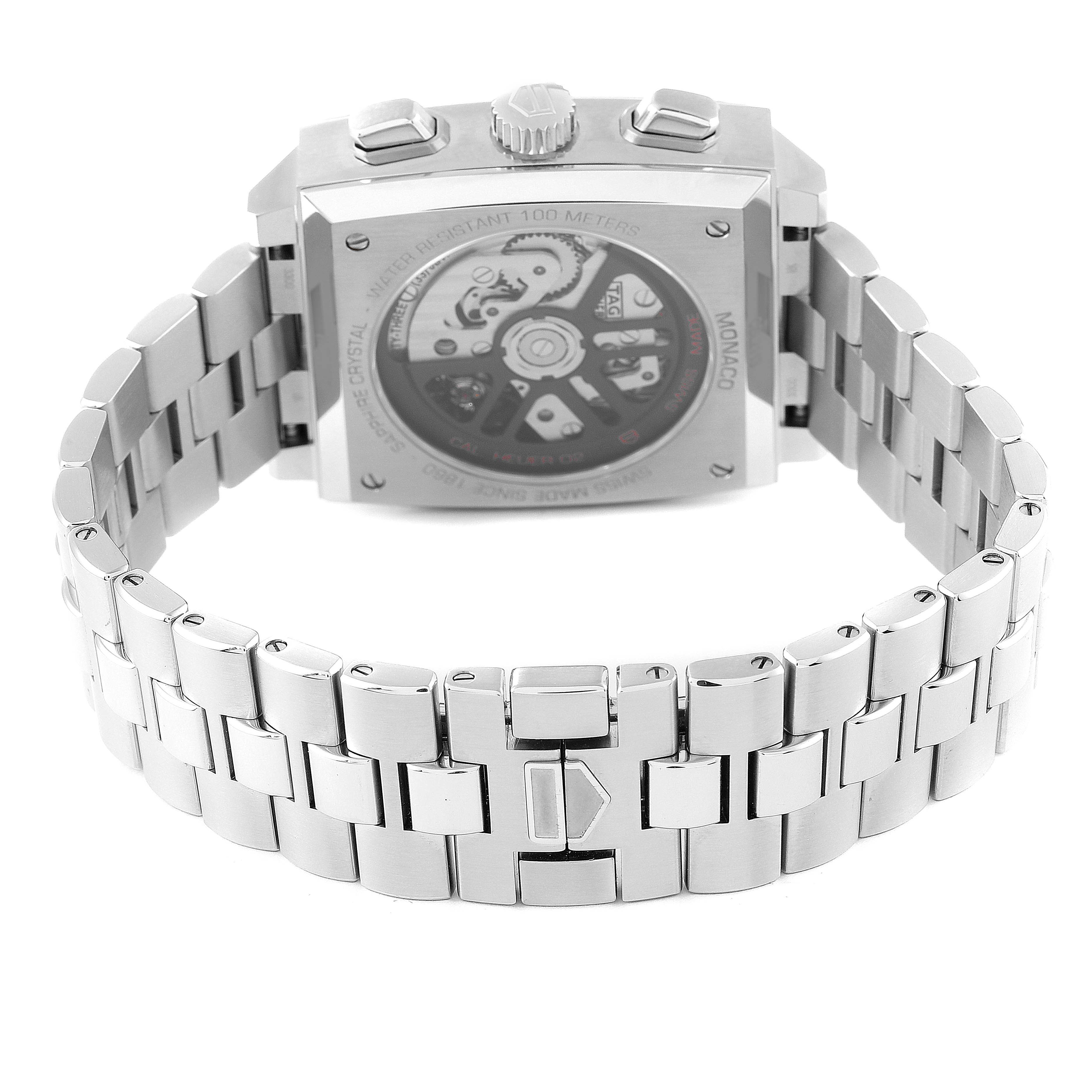 This image shows the back view of the Tag Heuer Monaco CBL2113 Men's Stainless Steel Black Dial CBL2113 Men's Stainless Steel Black Dial watch, highlighting its caseback, crown, and stainless steel bracelet.