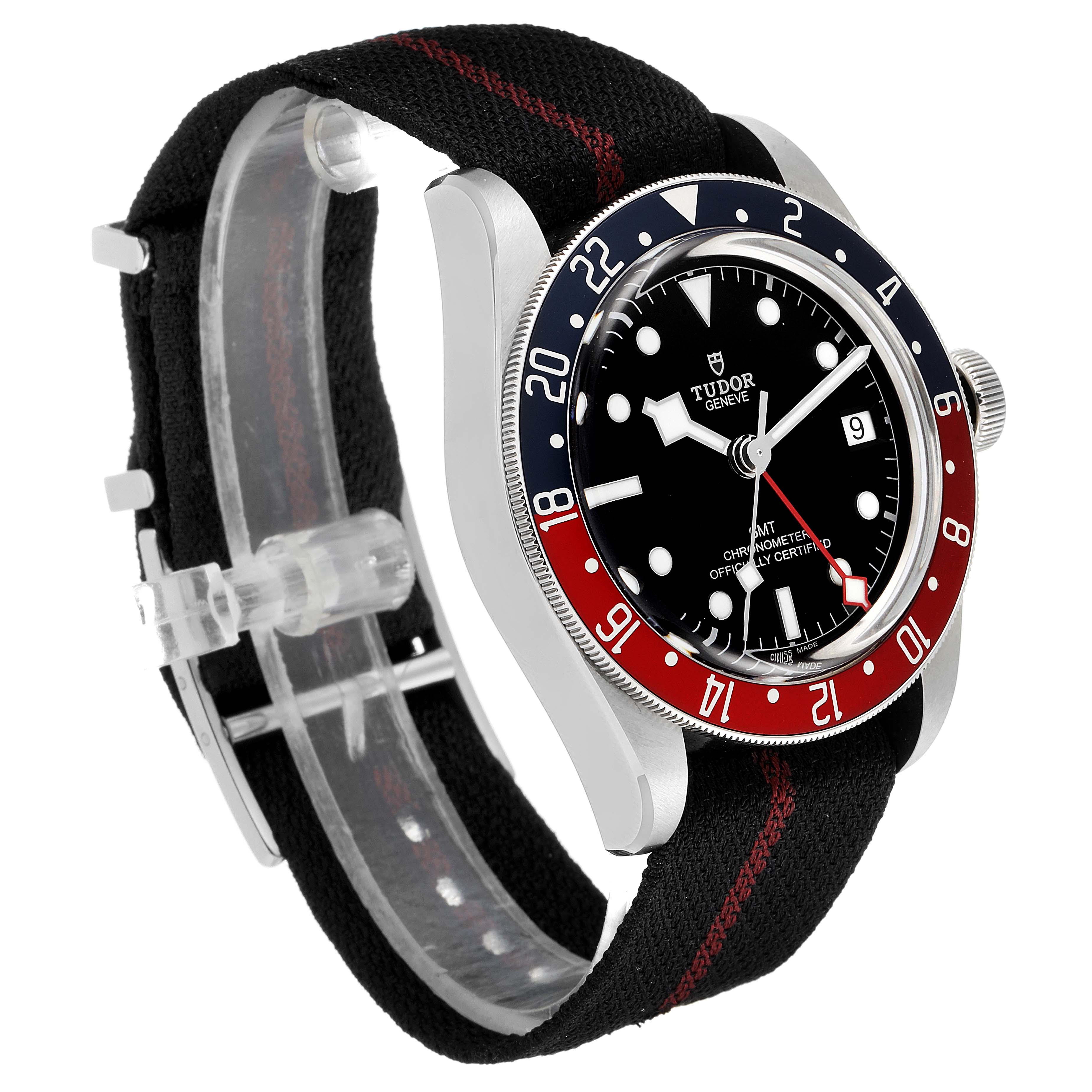 The image shows a side angle of the Tudor Heritage Black Bay 79830RB Men's Stainless Steel Black Dial 79830RB Men's Stainless Steel Black Dial watch with a black fabric strap and a red and blue bezel.