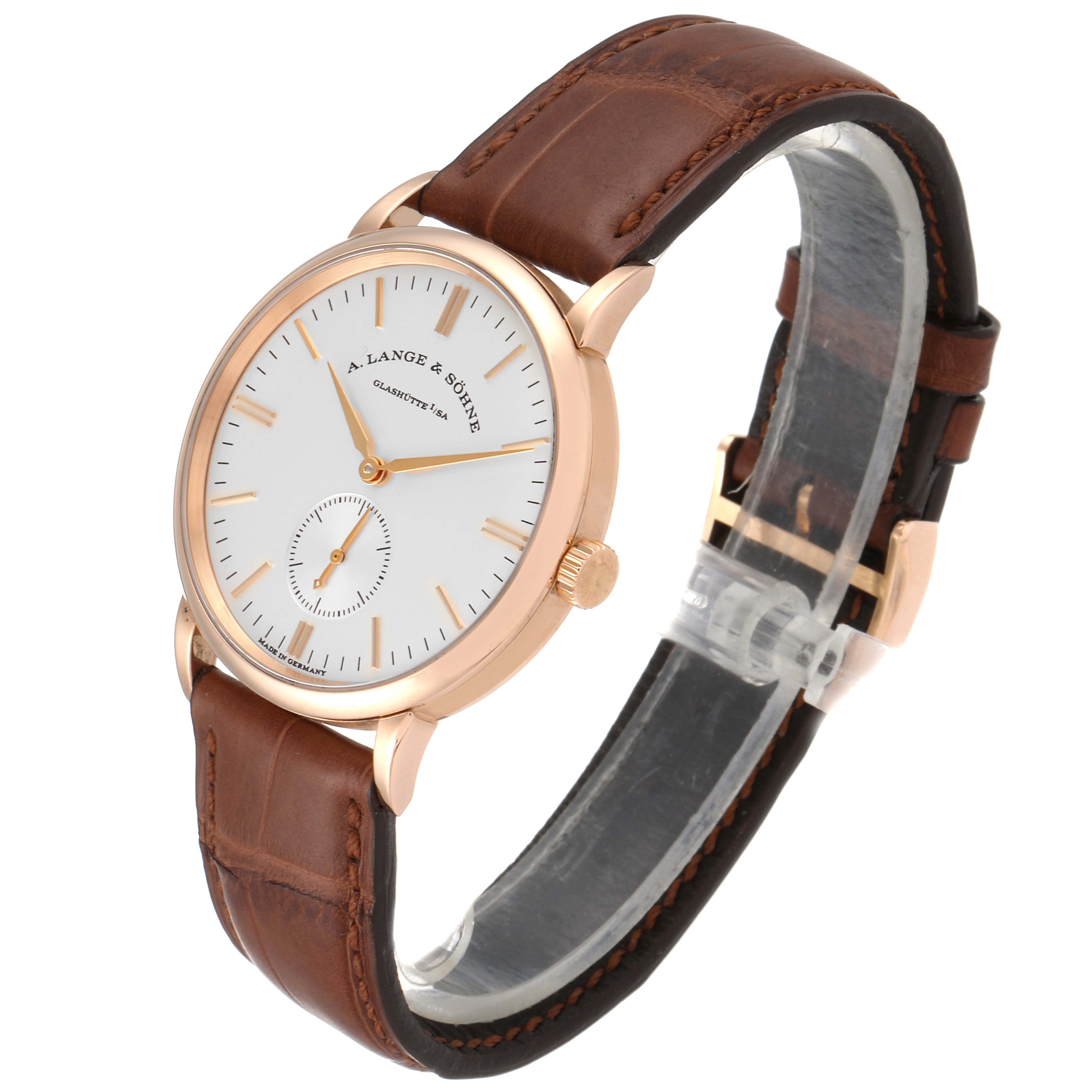 The Saxonia model by A. Lange & Söhne is shown at a side angle, highlighting its face, crown, and brown leather strap.