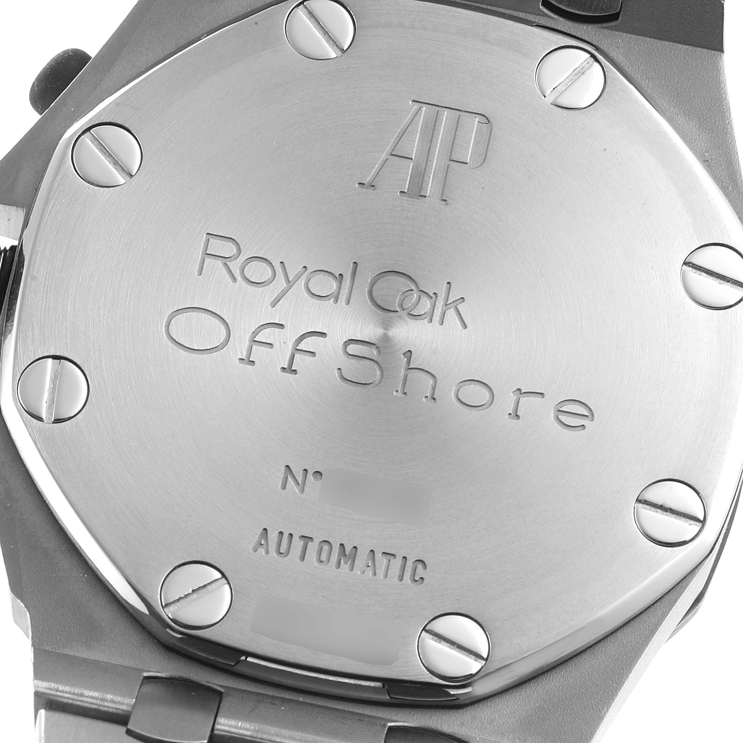 This image shows the back case of the Audemars Piguet Royal Oak Offshore 25721TI.O.1000TI.01 Men's Titanium Grey Dial 25721TI.O.1000TI.01 Men's Titanium Grey Dial model, featuring engraved branding and secured by screws.