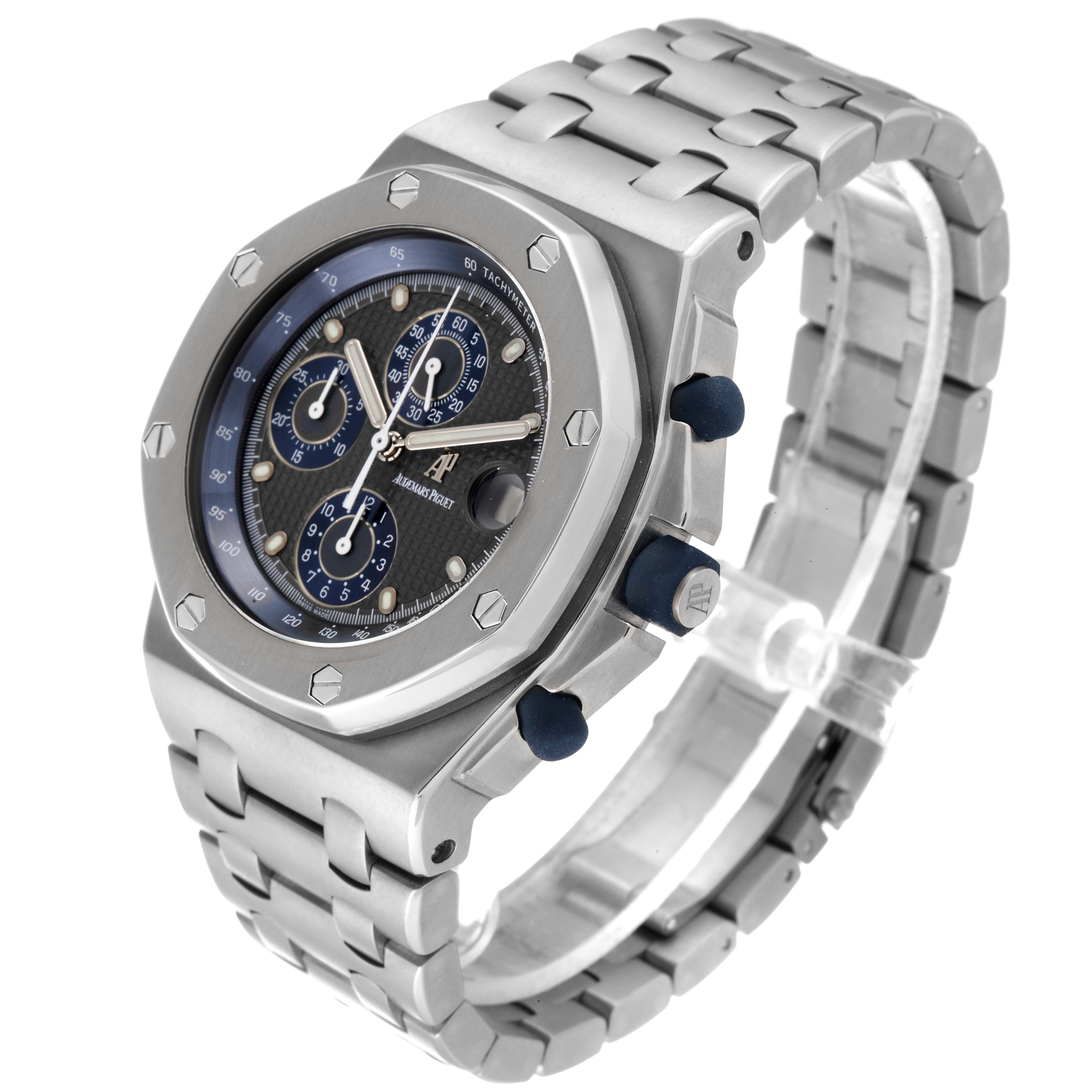 The image shows a side-angle view of an Audemars Piguet Royal Oak Offshore 25721TI.O.1000TI.01 Men's Titanium Grey Dial 25721TI.O.1000TI.01 Men's Titanium Grey Dial watch, highlighting its bezel, dial, and bracelet.