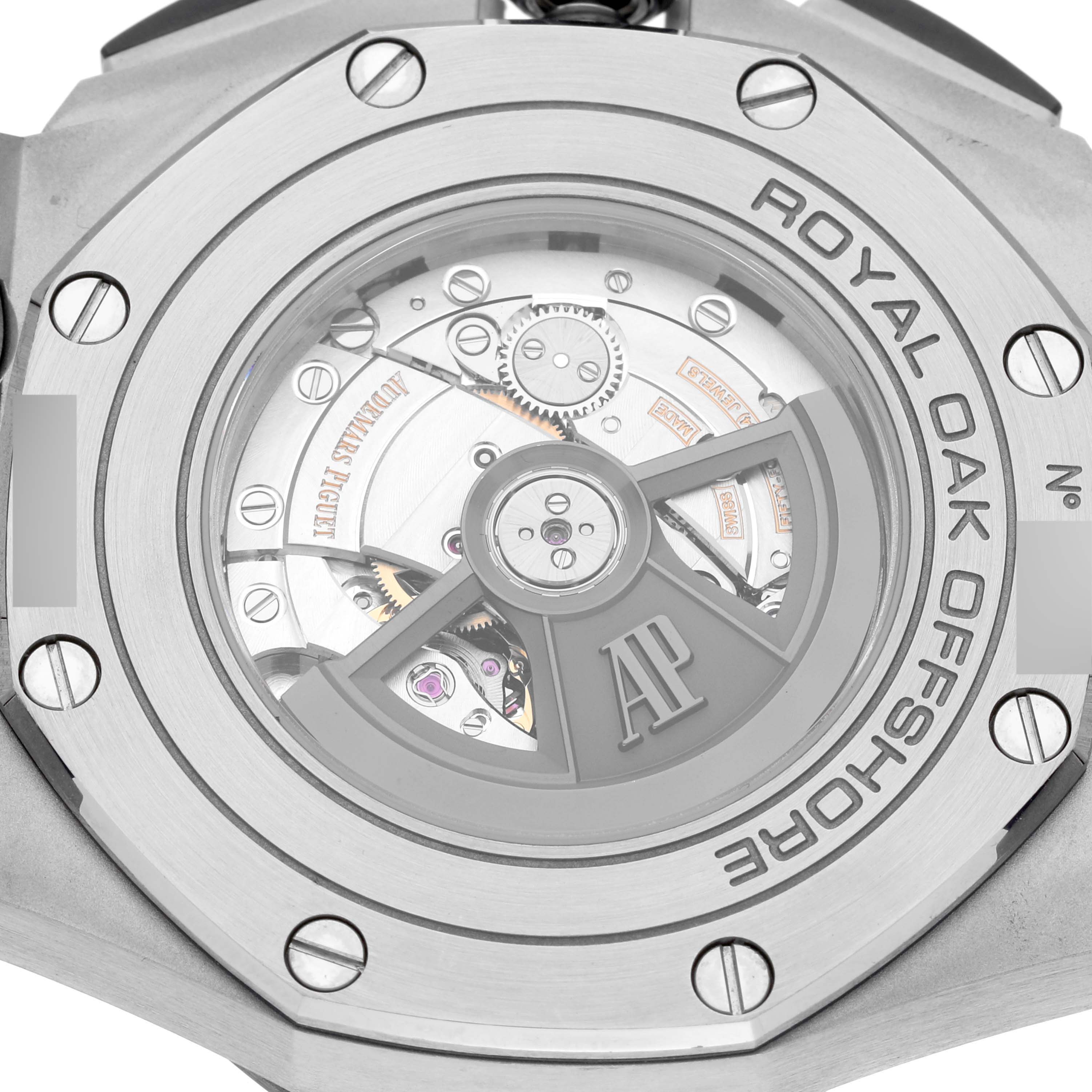 The image shows the back of the Audemars Piguet Royal Oak Offshore 26400SO.OO.A002CA.01 Men's Stainless Steel Silver Dial 26400SO.OO.A002CA.01 Men's Stainless Steel Silver Dial watch, highlighting its exposed movement and rotor.