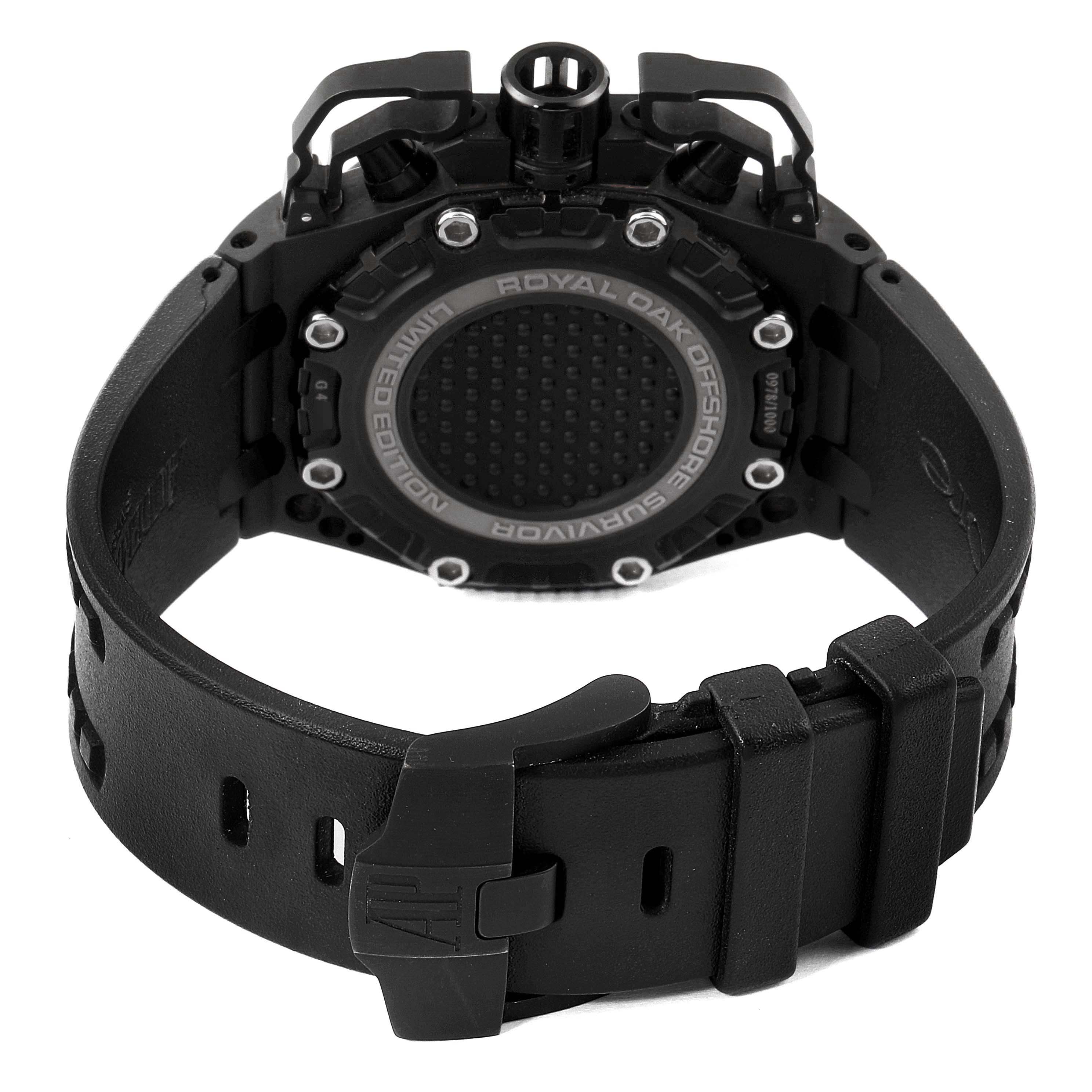 The image shows the back of an Audemars Piguet Royal Oak Offshore 26165IO.OO.A002CA.01 Men's Titanium Black Dial 26165IO.OO.A002CA.01 Men's Titanium Black Dial watch, focusing on the case back and rubber strap.