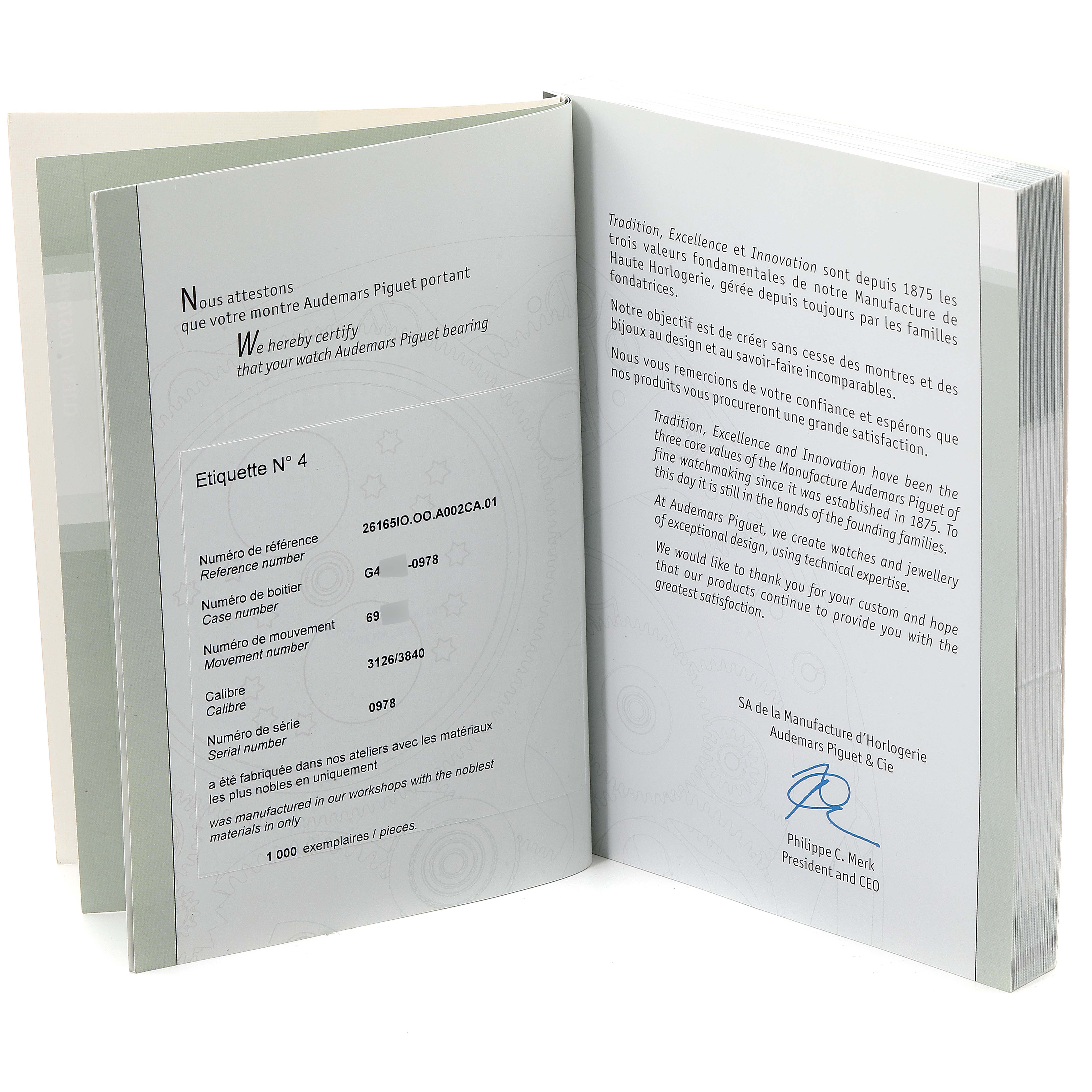 The image shows an opened certificate booklet for a Royal Oak Offshore model by Audemars Piguet.