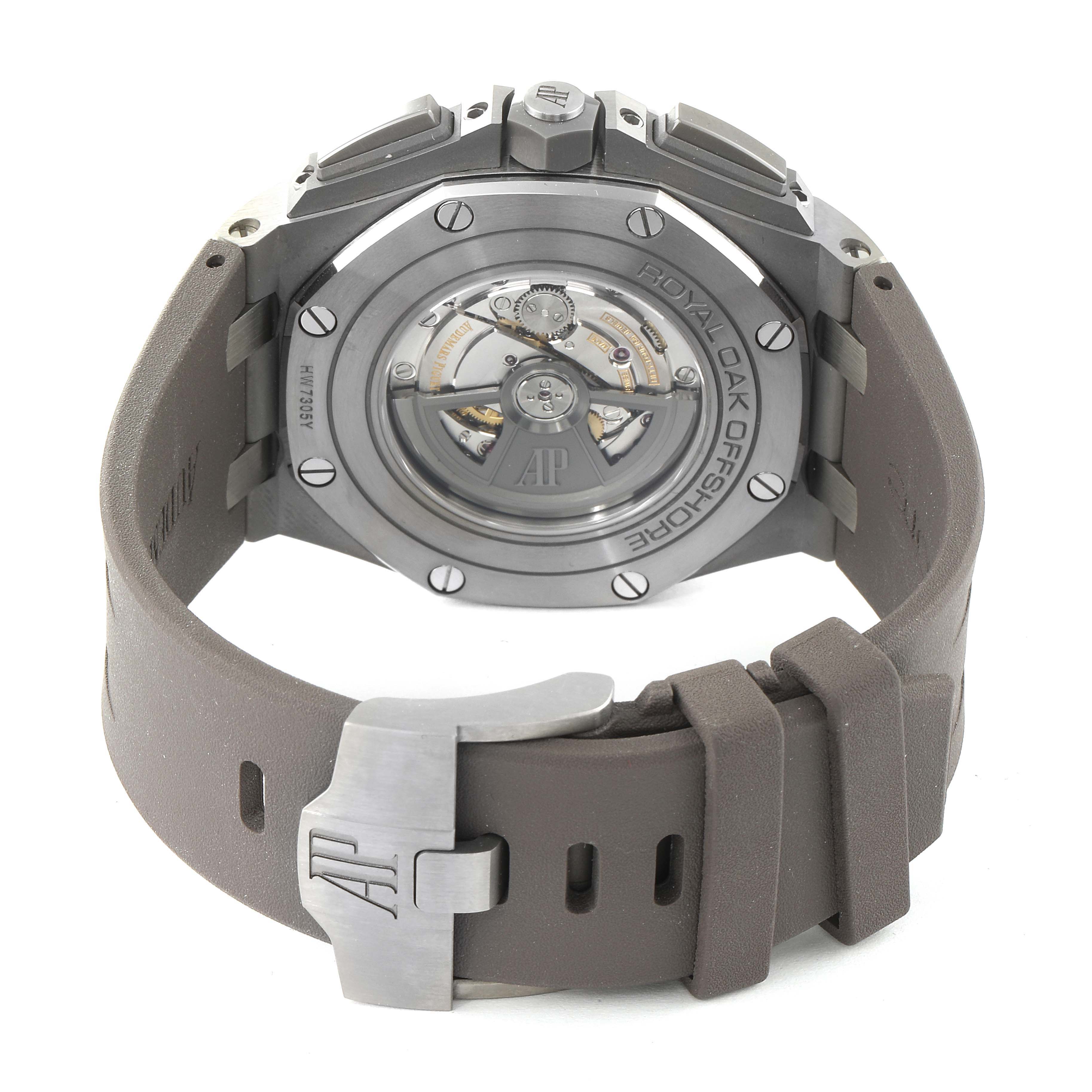 The image shows the back view of the Audemars Piguet Royal Oak Offshore 26400IO.OO.A004CA.02 Men
s Titanium Grey Dial 26400IO.OO.A004CA.02 Men
s Titanium Grey Dial watch and its rubber strap with clasp.