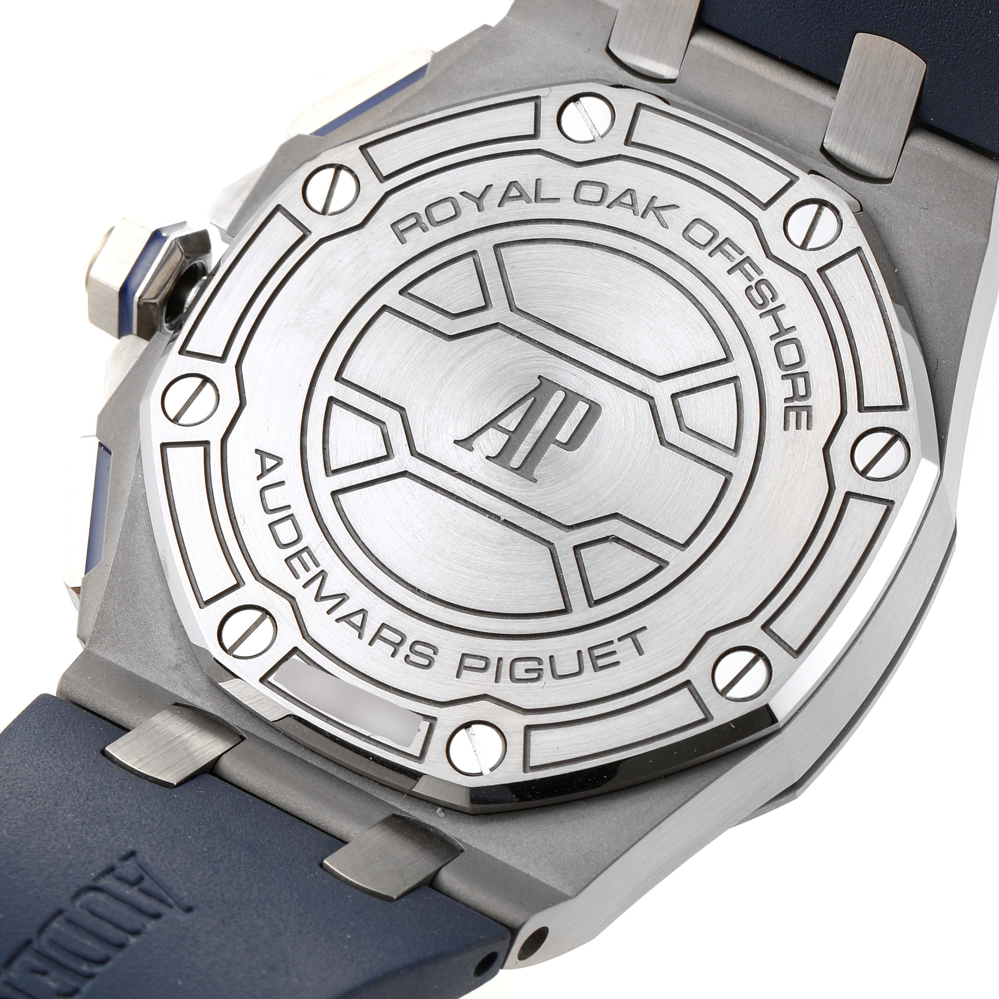 The image shows the back case of the Audemars Piguet Royal Oak Offshore 26480TI.OO.A027CA.01 Men's Titanium Blue Dial 26480TI.OO.A027CA.01 Men's Titanium Blue Dial watch, displaying the brand logo and model name.