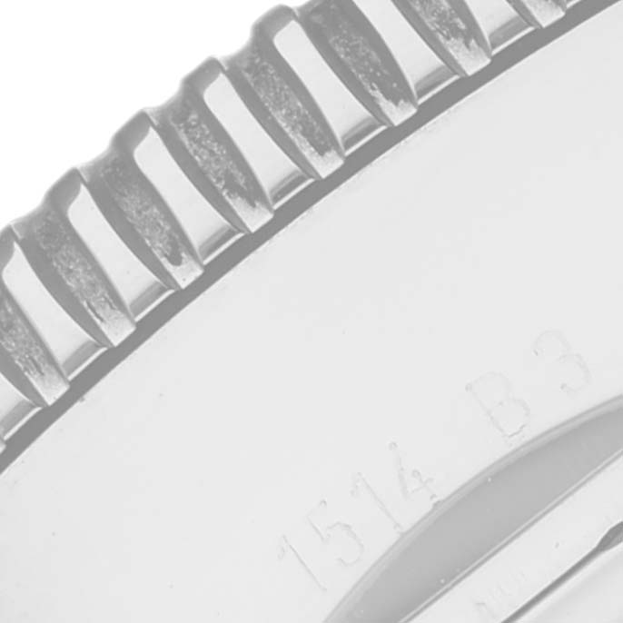 The image shows a close-up of the bezel and engravings on the side of a Breitling Superocean A13320 Men's Stainless Steel Silver Dial A13320 Men's Stainless Steel Silver Dial watch.