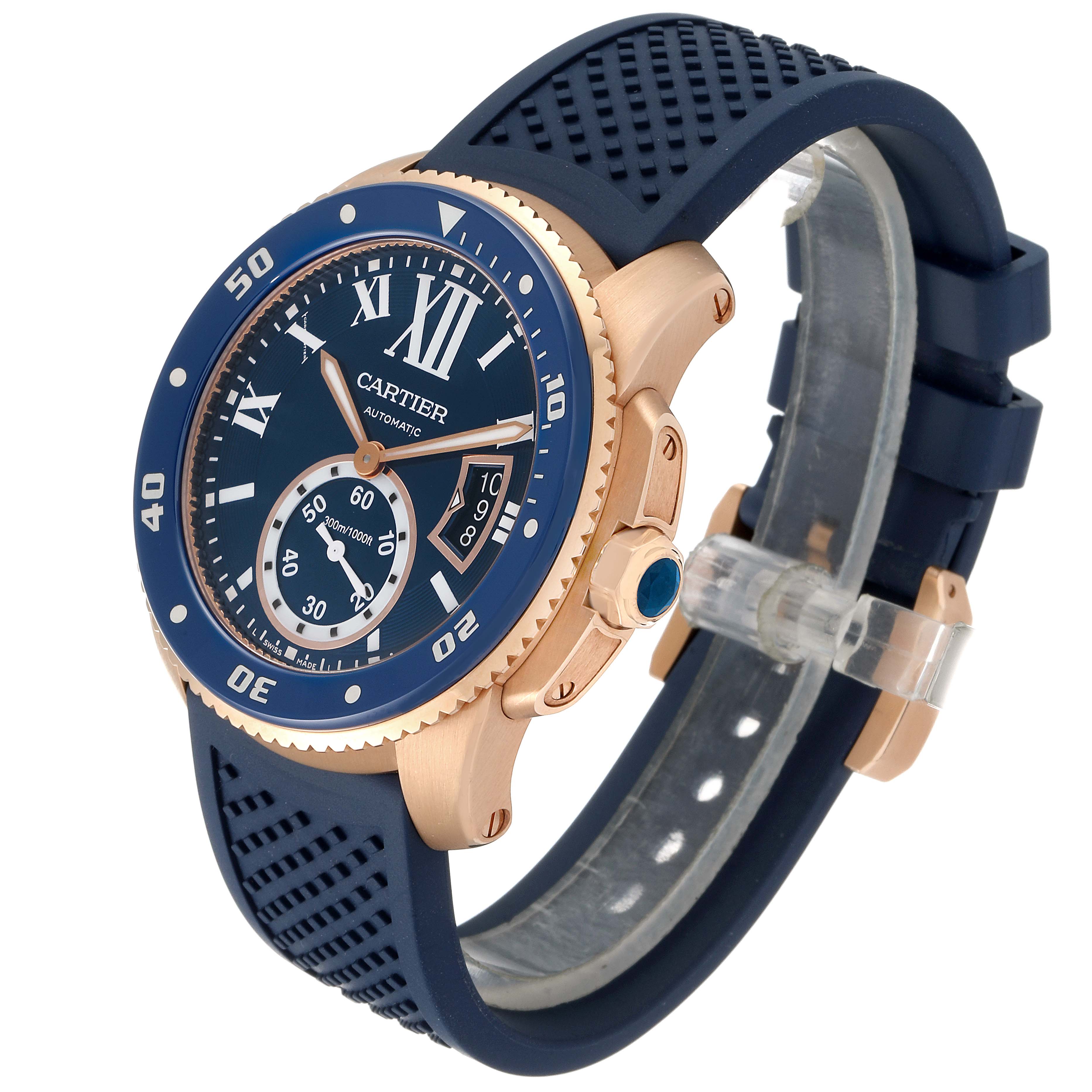 The image shows a Calibre de Cartier watch by Cartier at a three-quarter angle, highlighting its blue strap, dial, and rose gold casing.