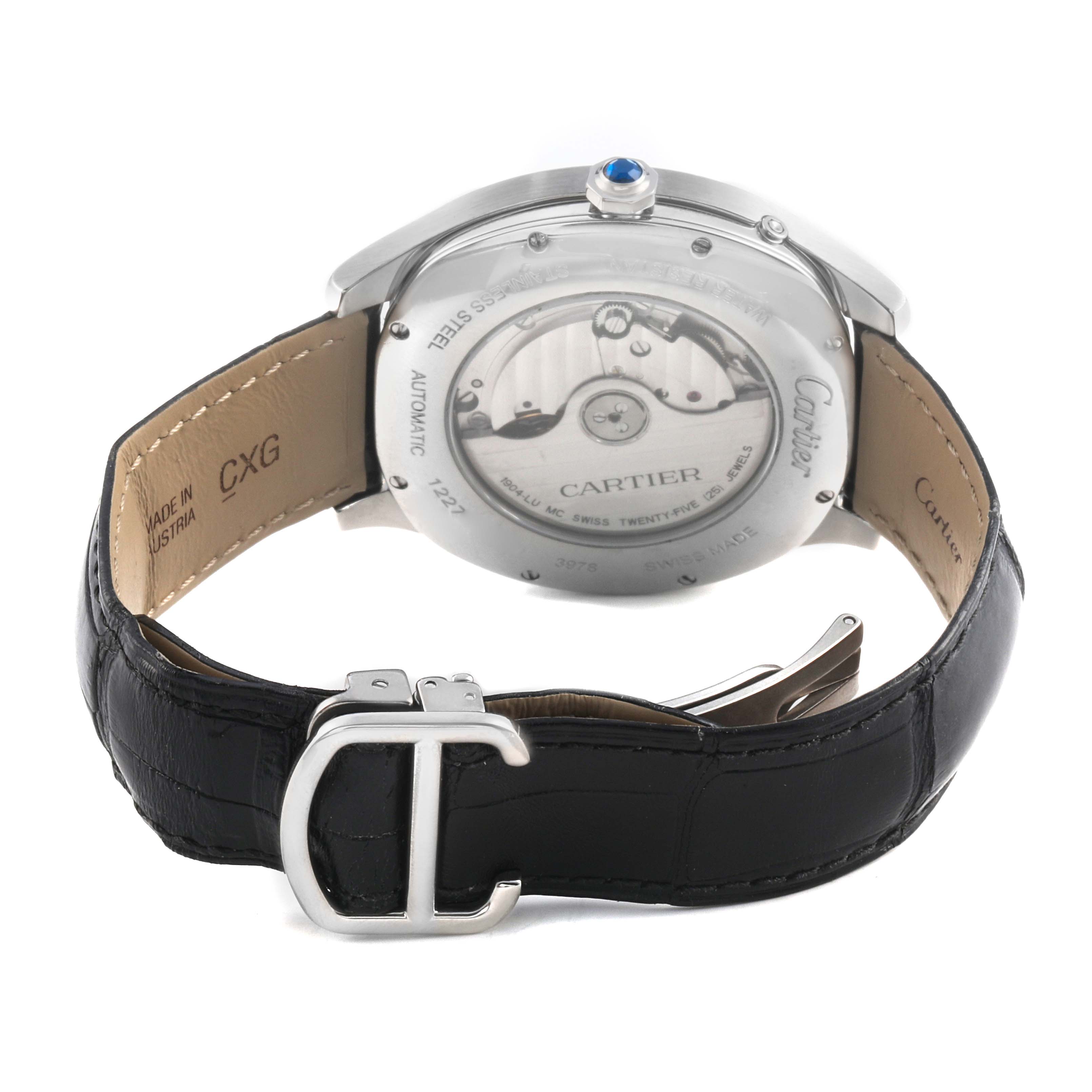 The Drive de Cartier watch is shown from the back, highlighting its automatic movement and black leather strap with a branded clasp.