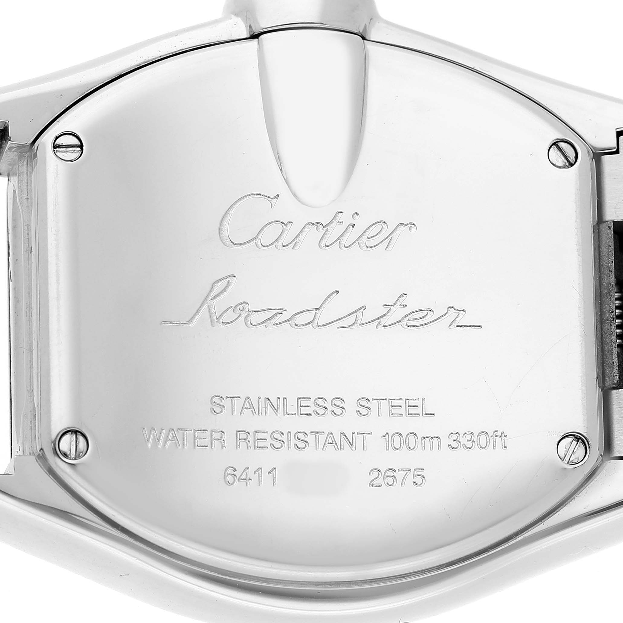 The image shows the back case of a Cartier Roadster W62026Y4 Women's Steel and Gold (two tone) Transparent Dial watch, highlighting engravings and screws.