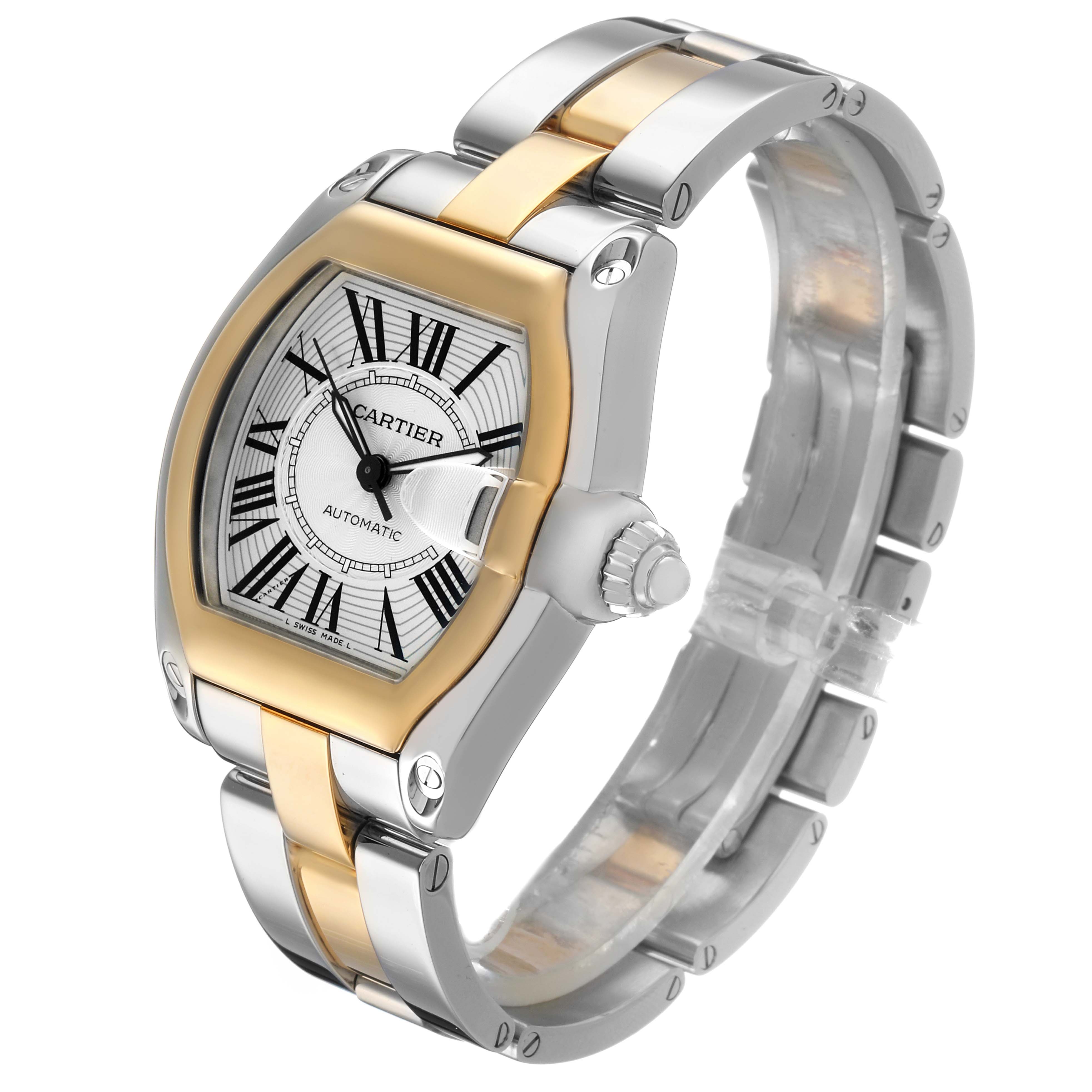 The image shows a Cartier Roadster W62031Y4 Men's Steel and Gold (two tone) Silver Dial watch at a three-quarter angle, displaying its face, case, crown, and metal bracelet.