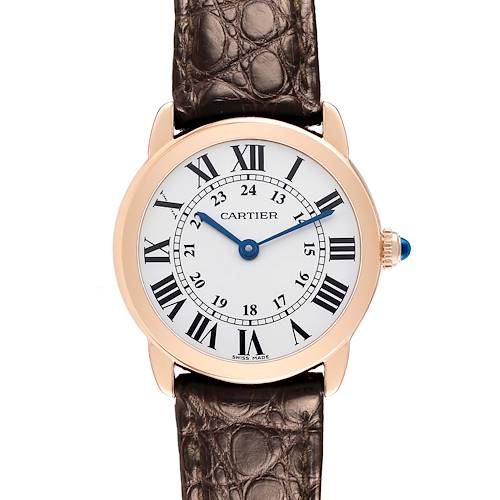 The Cartier Ronde W6701007 Women's Rose Gold Silver Dial watch is shown from a top-down angle, displaying the face, Roman numerals, and textured leather strap.