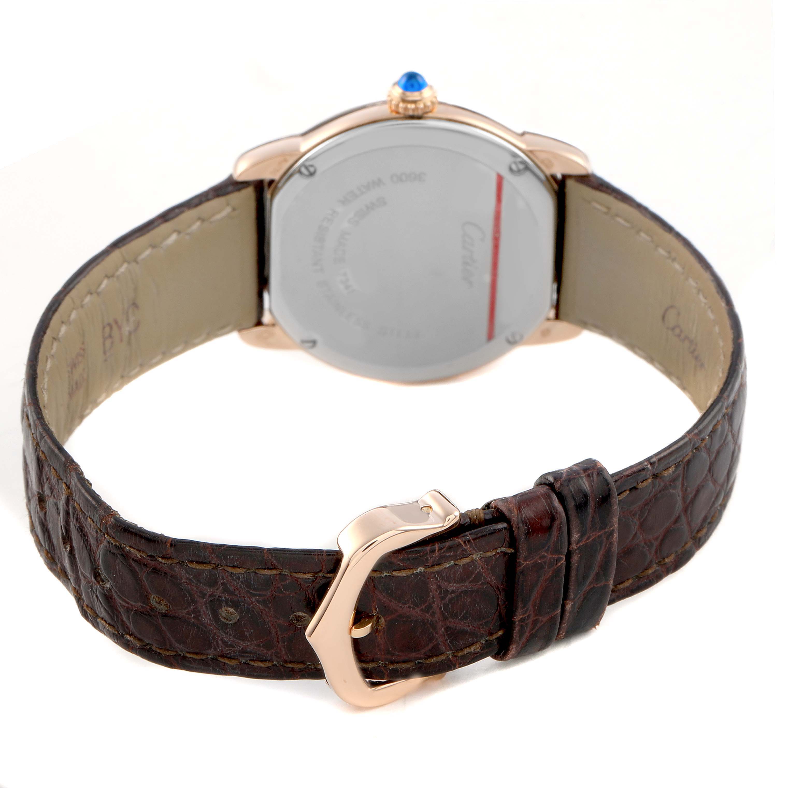 The image shows the back of a Cartier Ronde W6701007 Women's Rose Gold Silver Dial watch, focusing on the leather strap and clasp, with a side view of the case and crown.