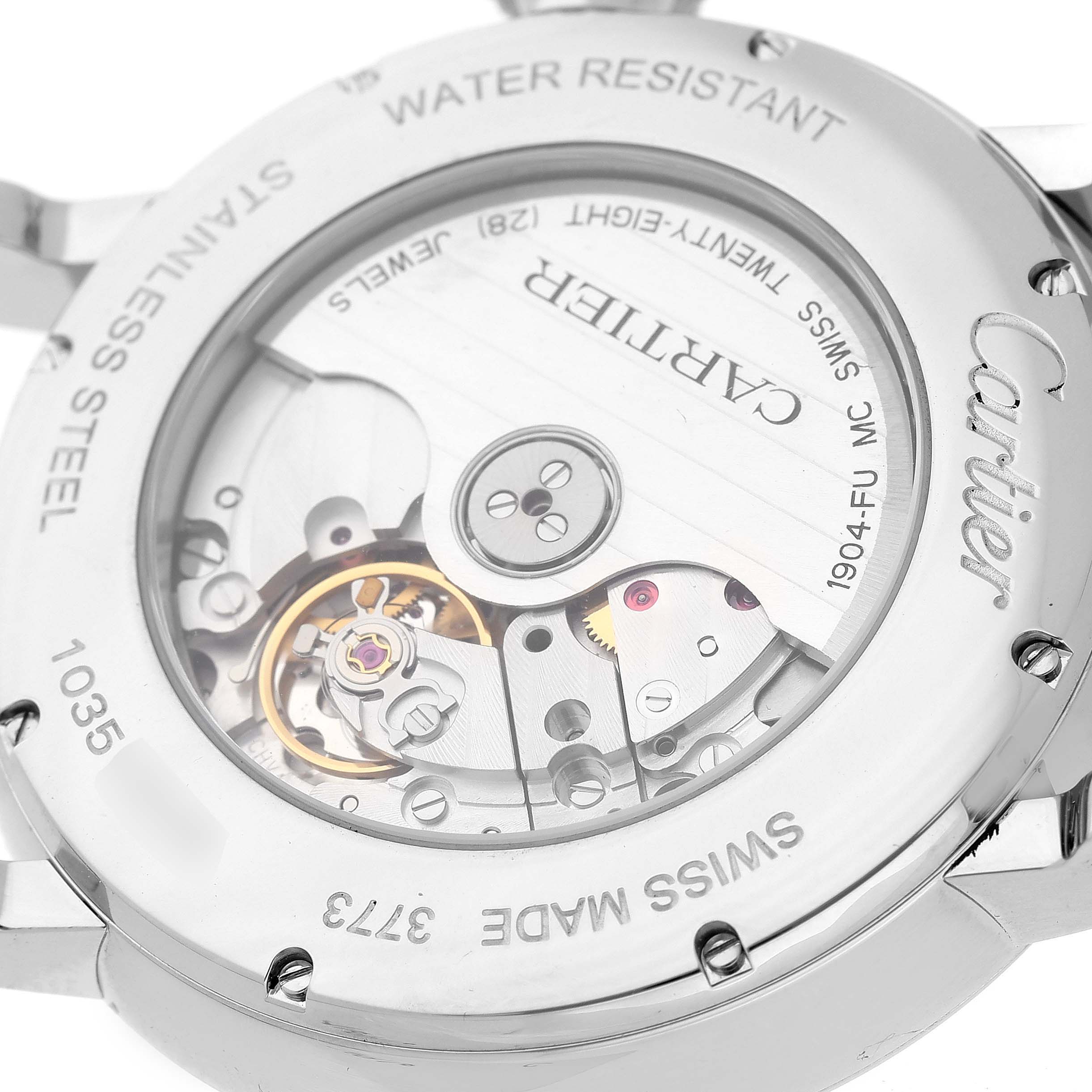 The image shows the case back of a Rotonde model by Cartier, revealing the intricate movement and engravings.