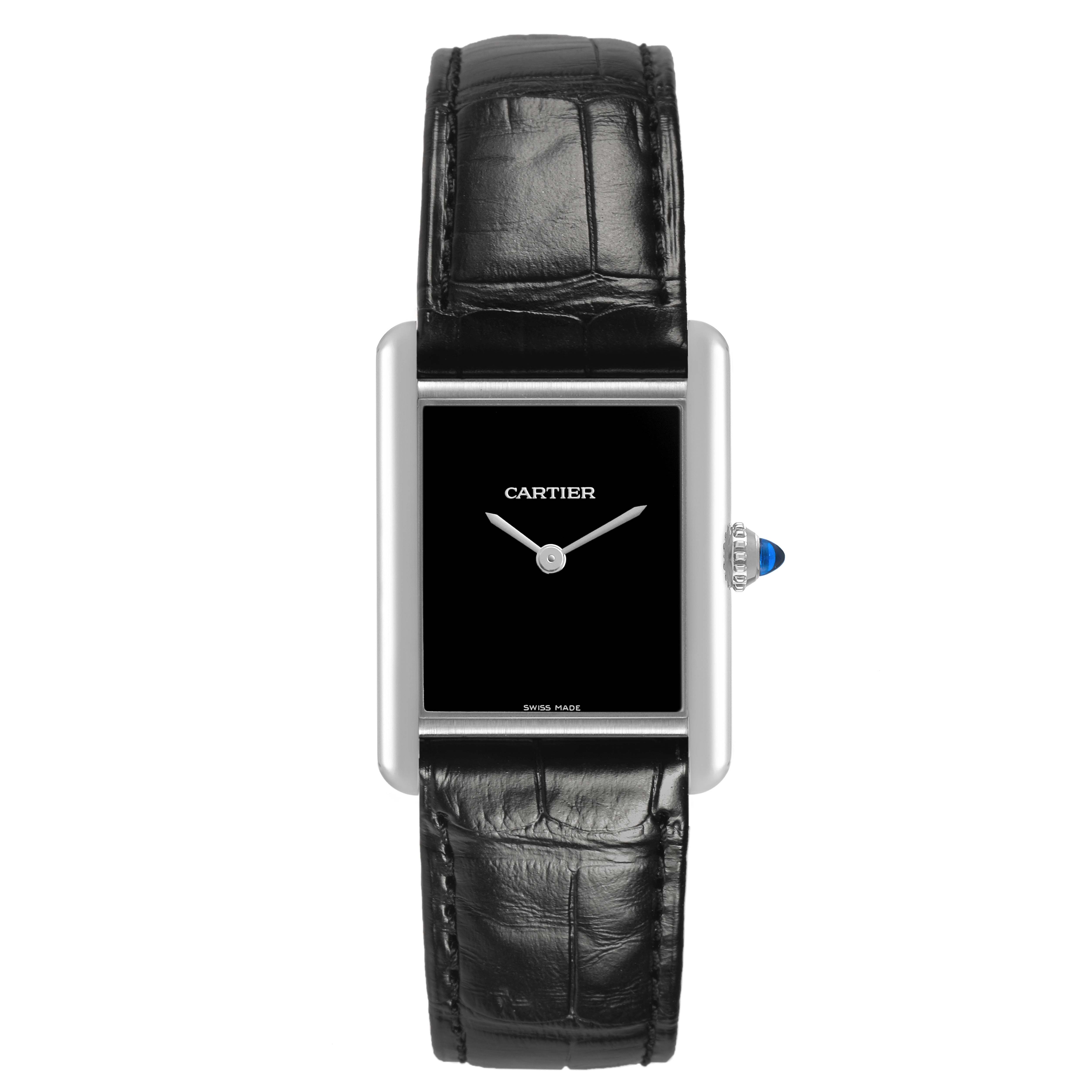 The Cartier Tank Must WSTA0072 Women's Stainless Steel Black Dial watch is shown from a top-down angle, displaying the black dial, case, crown, and leather strap.
