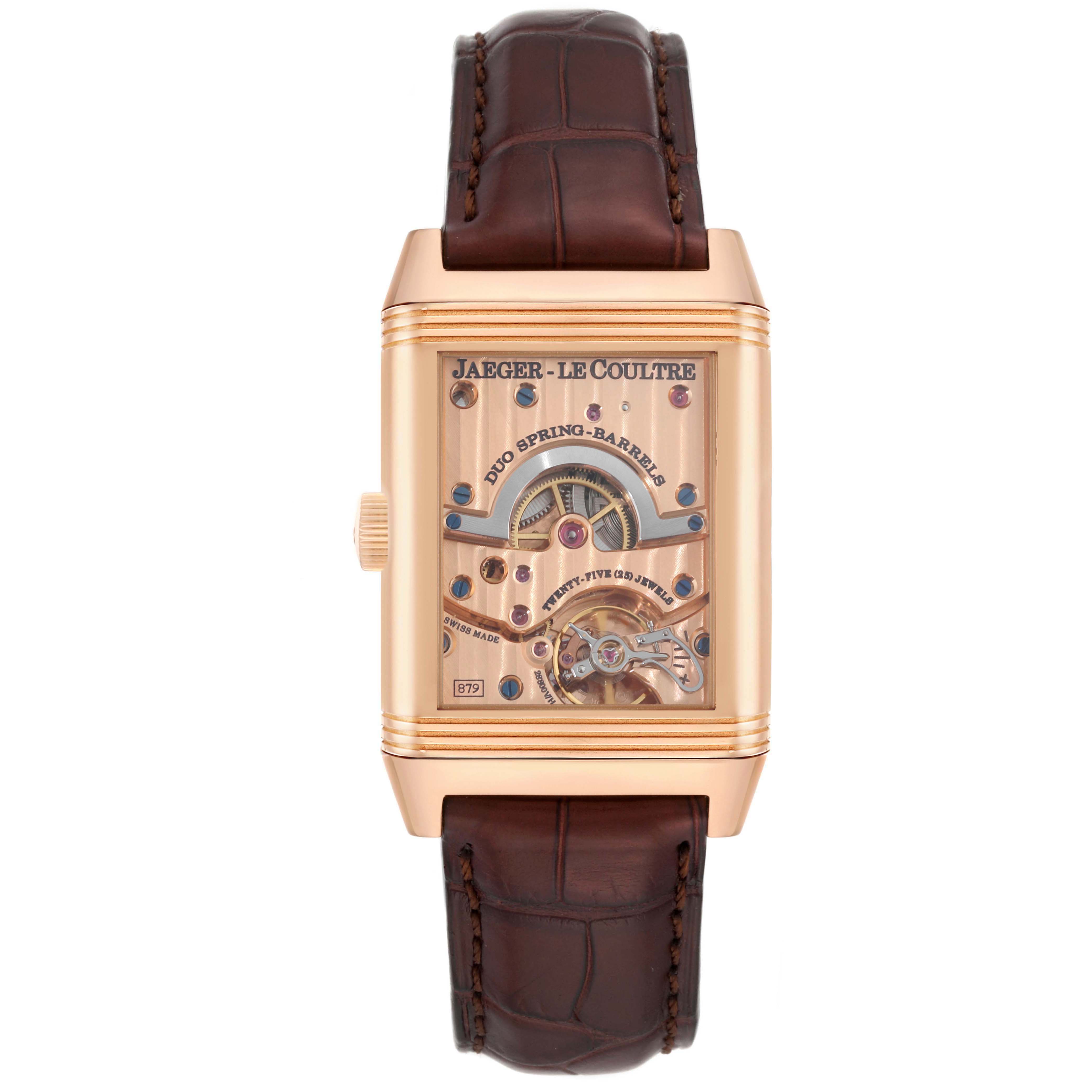 The Jaeger LeCoultre Reverso Q3002420 Men's Rose Gold Silver Dial watch is shown from the front, displaying its intricate mechanical interior and rose gold case.