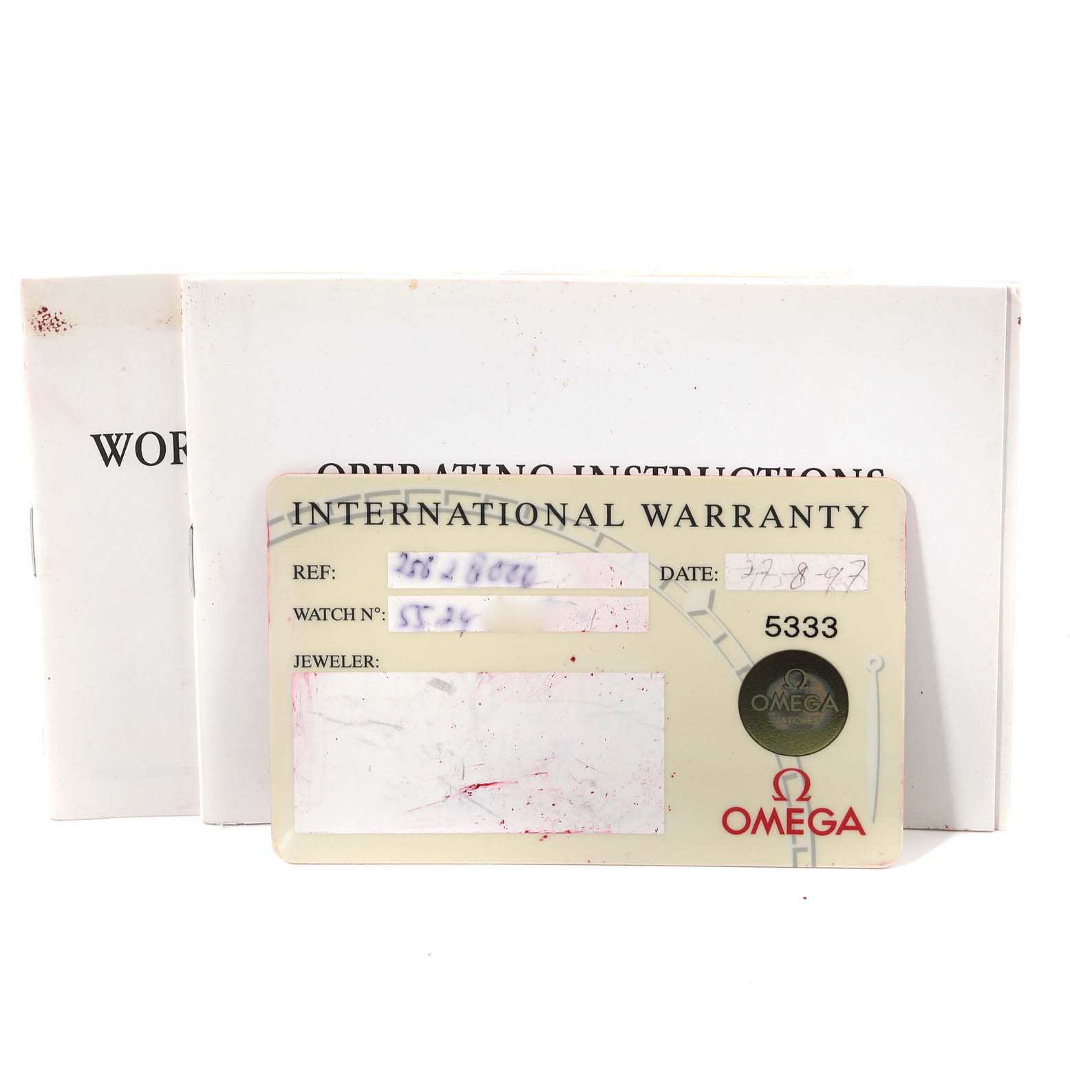 This image shows the international warranty card and operating instructions for the Omega Seamaster 2562.80.00 Men
s Stainless Steel Blue Dial 2562.80.00 Men
s Stainless Steel Blue Dial watch model.