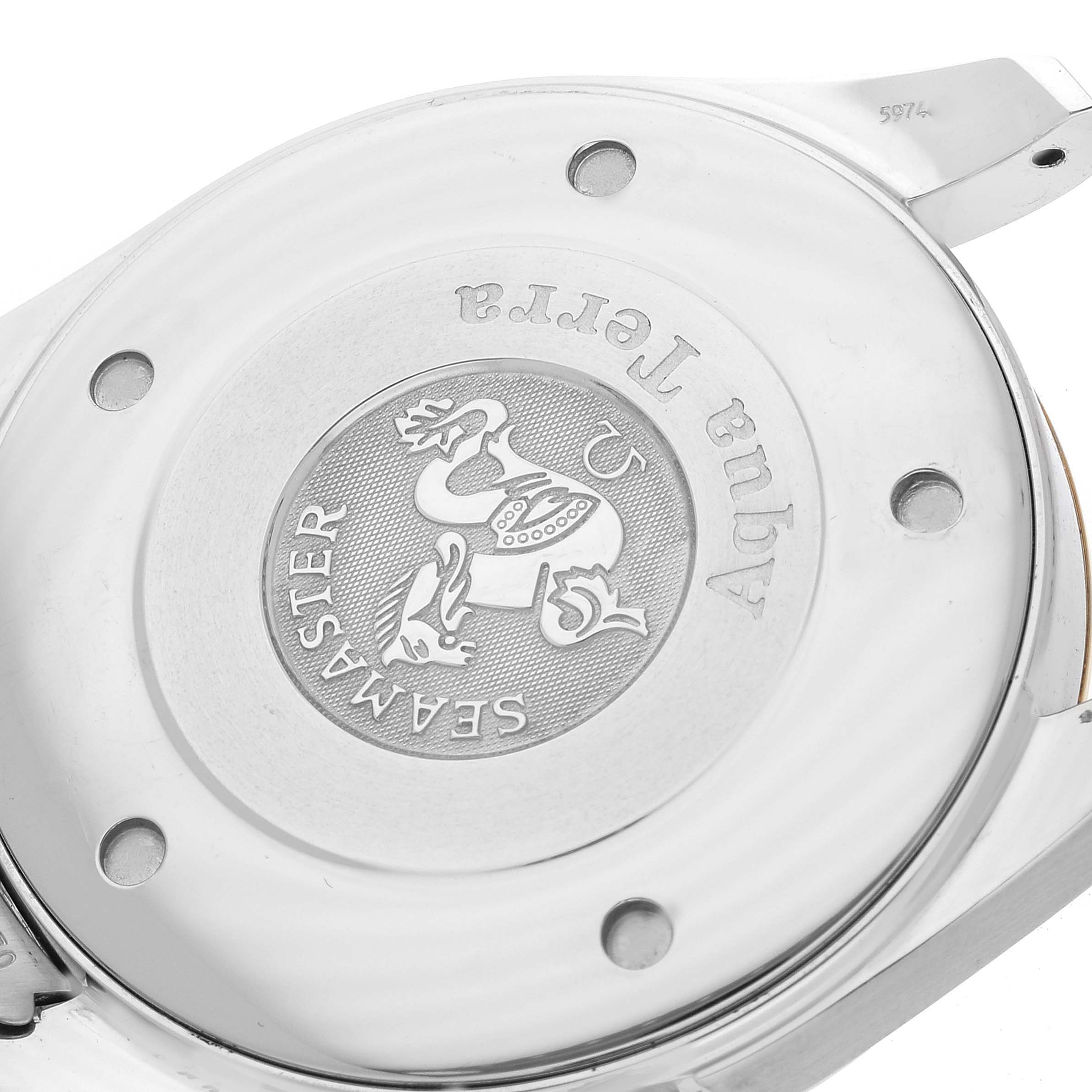 The image shows the stainless steel case back of the Omega Seamaster Aqua Terra watch, displaying its engraving and logo.