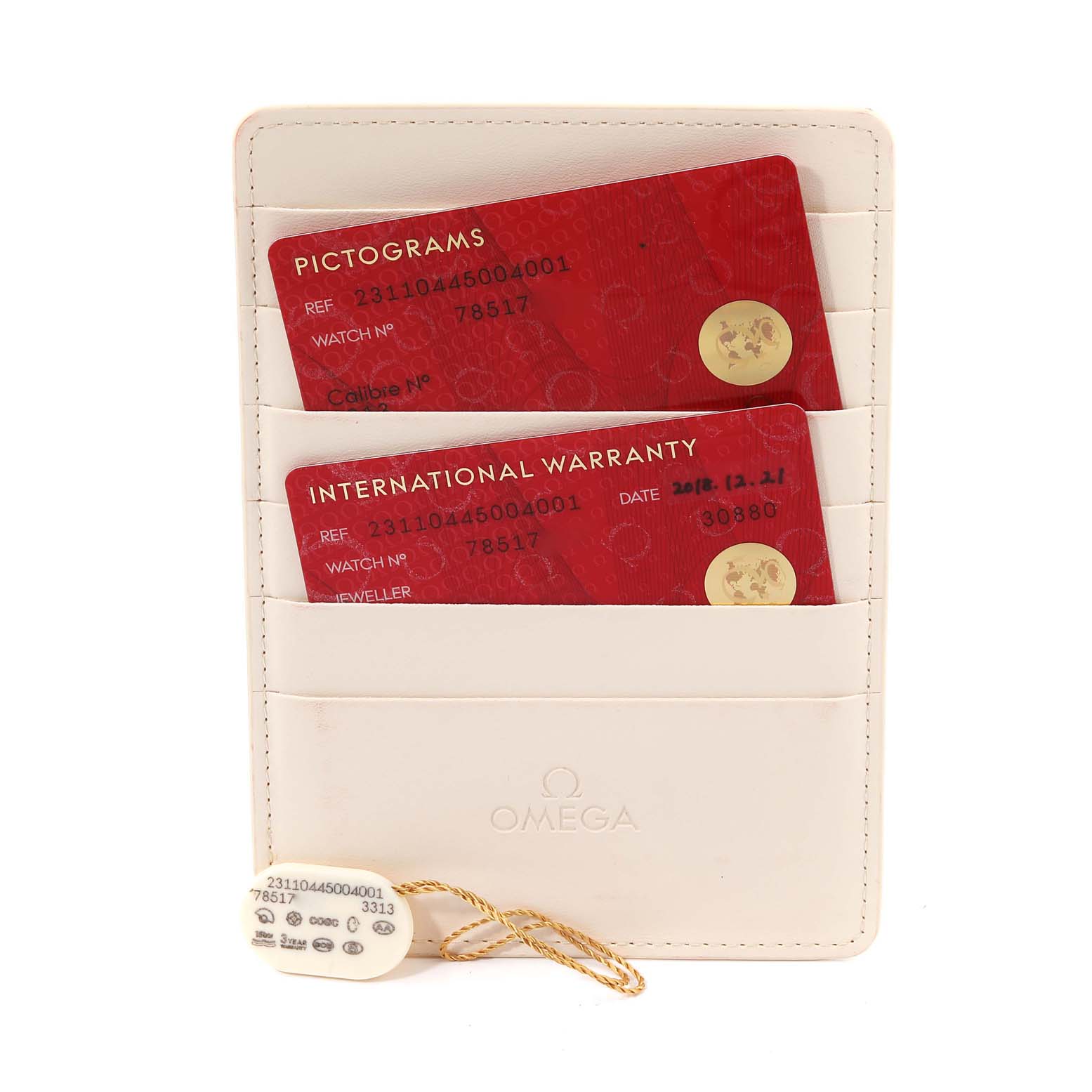 The image shows an Omega Aqua Terra 231.10.44.50.04.001 Men
s Stainless Steel White Dial 231.10.44.50.04.001 Men
s Stainless Steel White Dial model
s sales package contents: two red cards for pictograms and international warranty, and a tag.